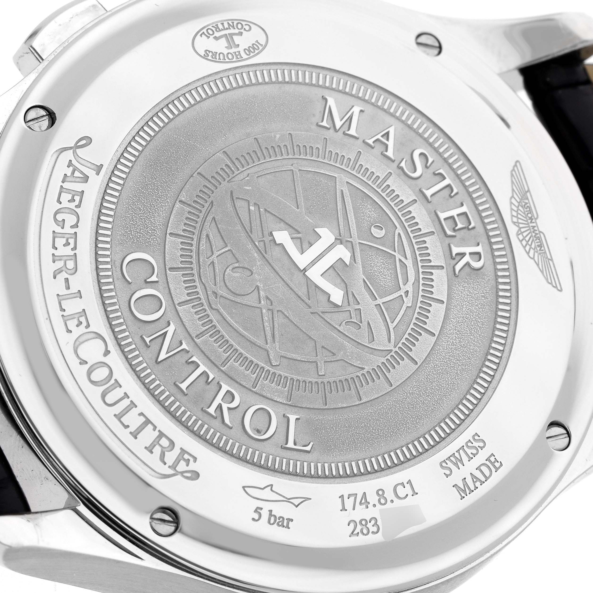 The image shows the back case of a Jaeger-LeCoultre Master model watch with visible engravings and logo.