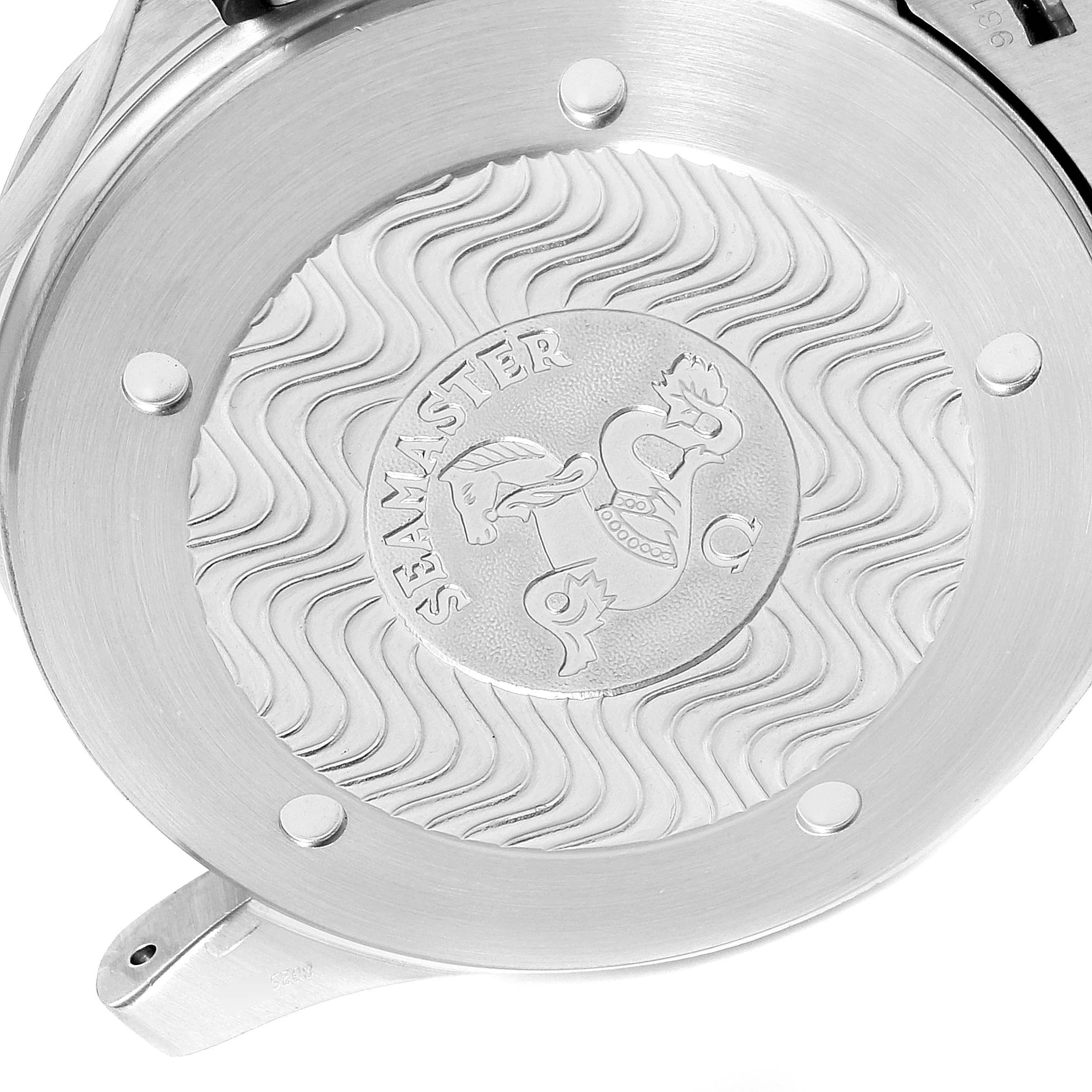 This image shows the back of an Omega Seamaster 2538.20.00 Men's Stainless Steel White Dial 2538.20.00 Men's Stainless Steel White Dial watch, highlighting its engraved design and wave pattern.
