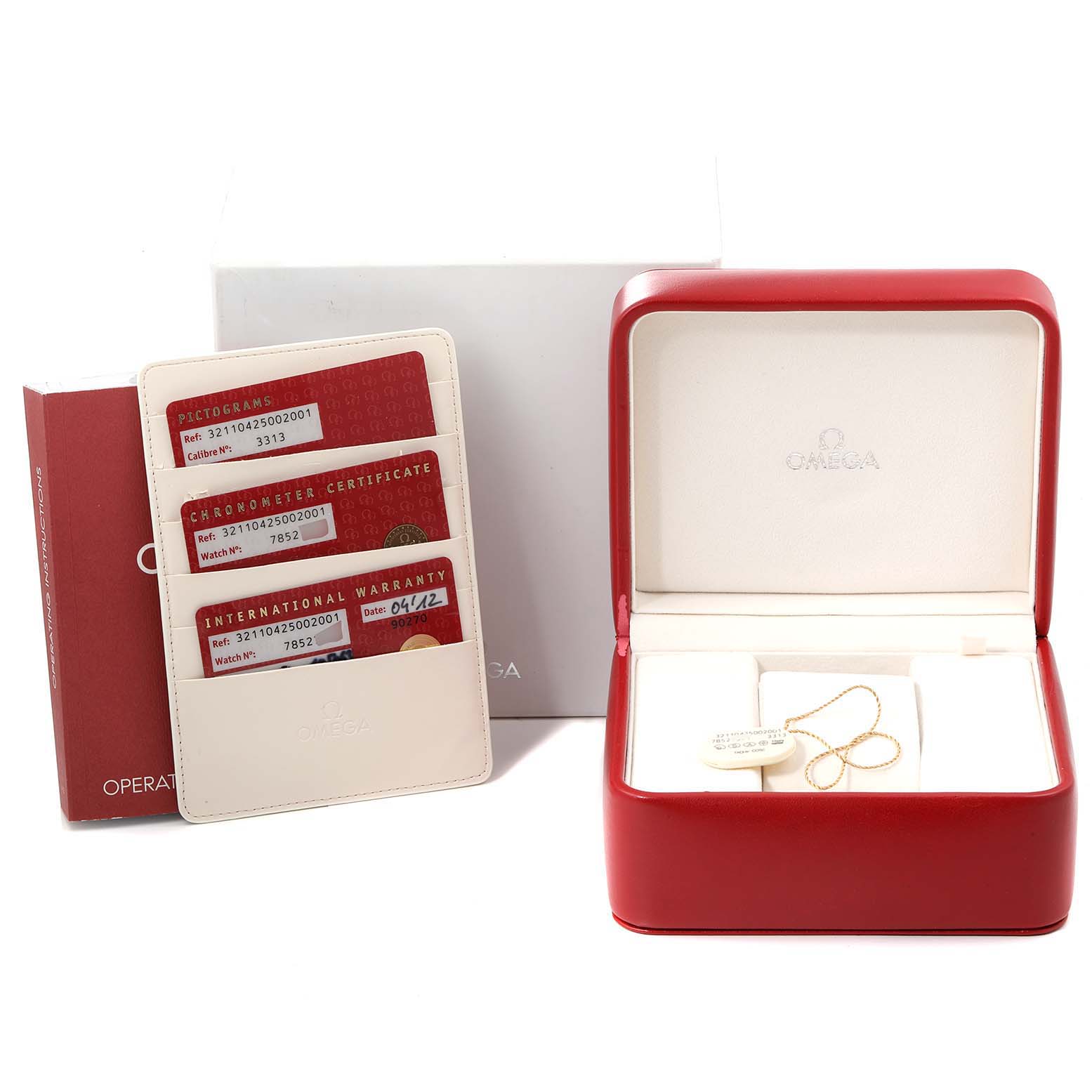 The image shows an Omega Speedmaster 321.10.42.50.02.001 Men
s Stainless Steel Silver Dial 321.10.42.50.02.001 Men
s Stainless Steel Silver Dial watch box, warranty cards, and certificates, but not the watch itself.