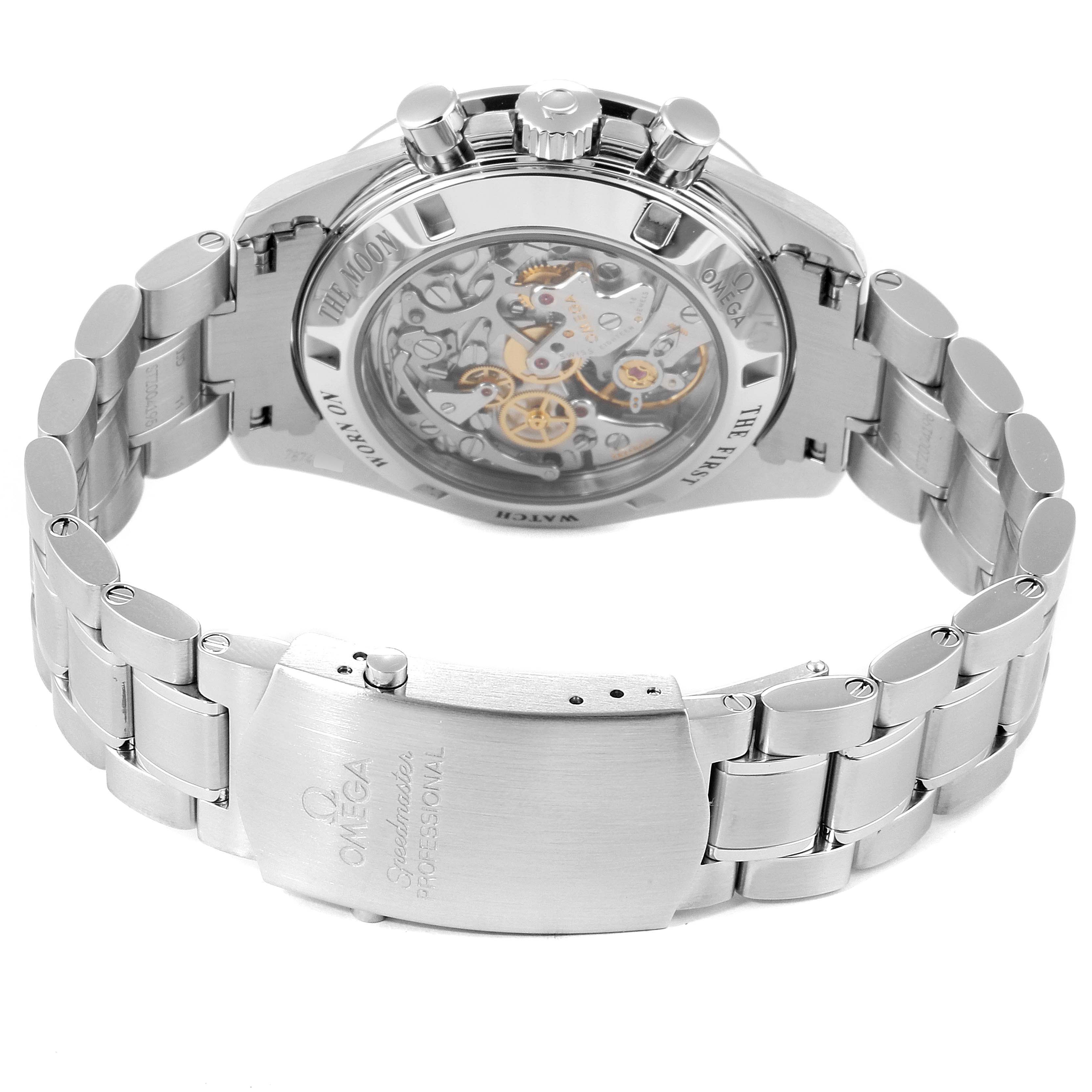 The image shows the back view of an Omega Speedmaster 311.30.42.30.01.006 Men's Stainless Steel Black Dial 311.30.42.30.01.006 Men's Stainless Steel Black Dial watch, highlighting its clasp and internal mechanics.