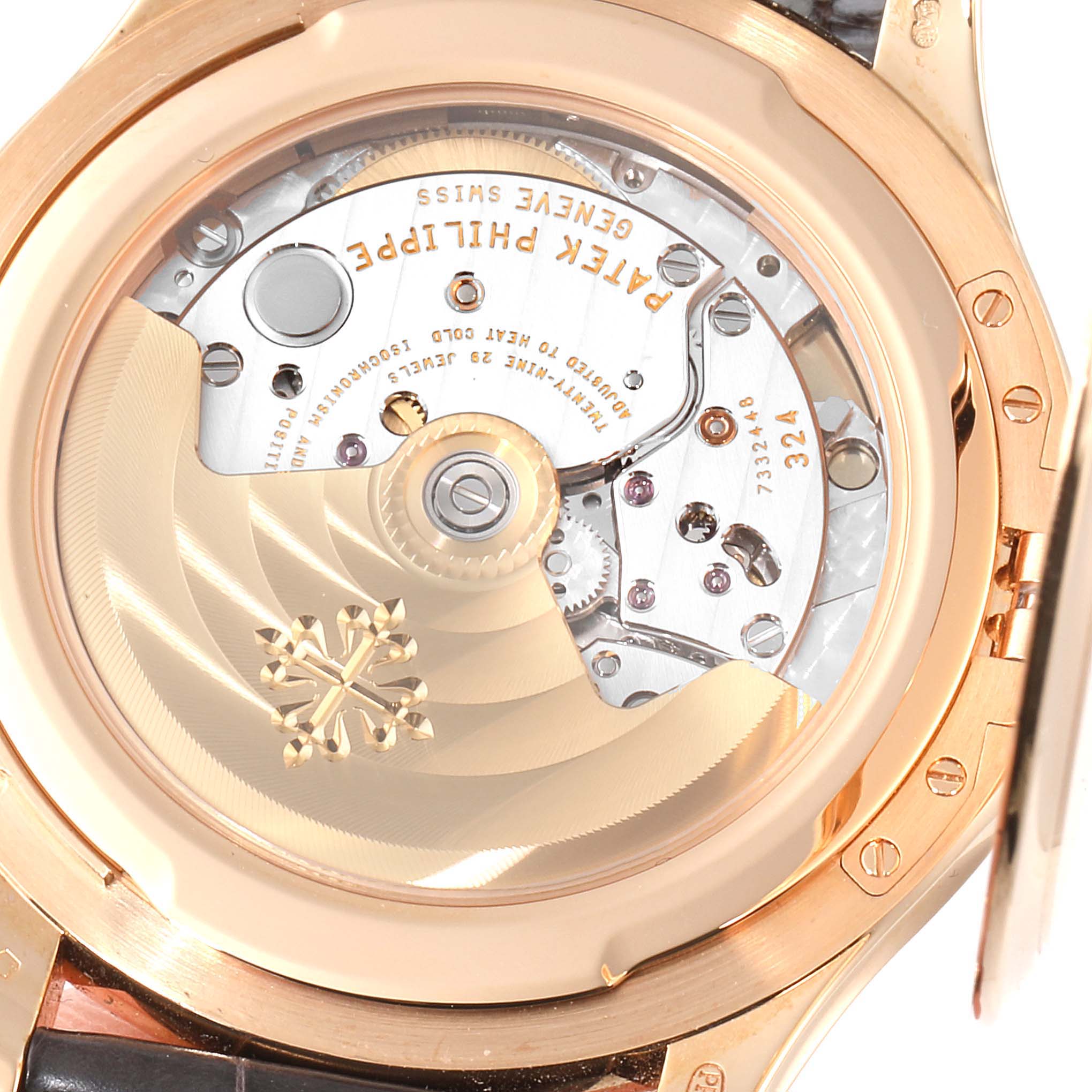 This image shows the case back of a Patek Philippe Calatrava 5227R-001 Men's Rose Gold Beige Dial 5227R-001 Men's Rose Gold Beige Dial watch, revealing its internal mechanism and movement.