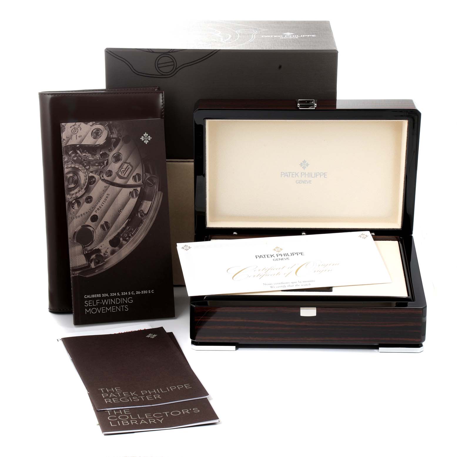 The image shows the packaging, documentation, and the presentation box for a Patek Philippe Calatrava 5227R-001 Men's Rose Gold Beige Dial 5227R-001 Men's Rose Gold Beige Dial watch.