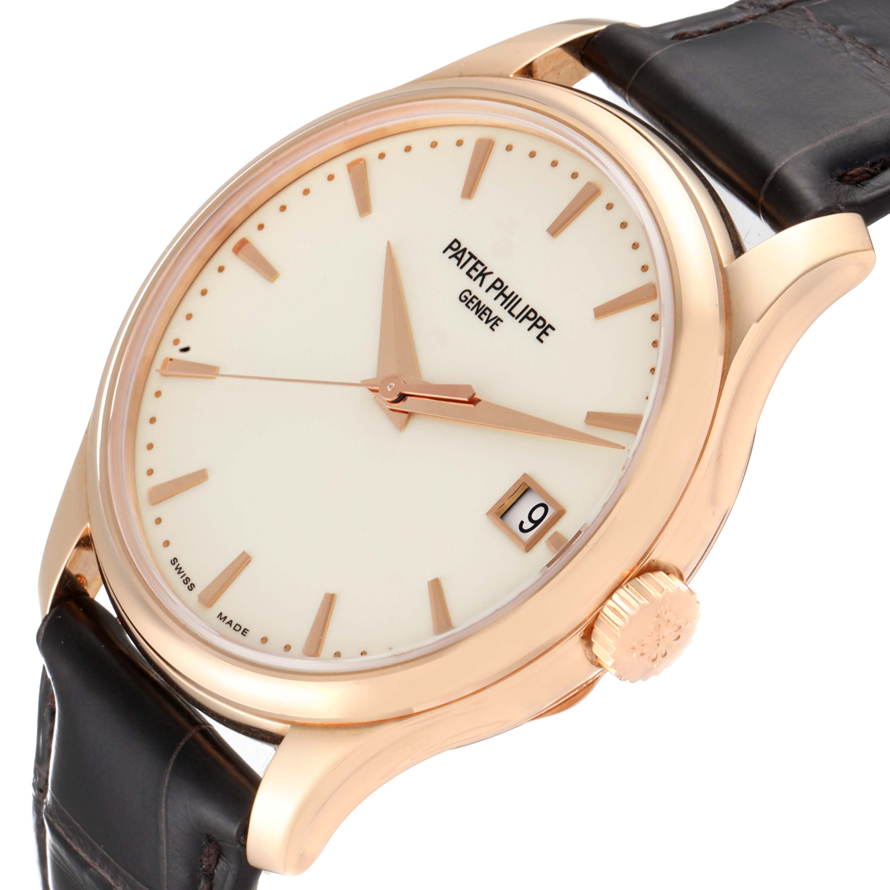 The image shows a close-up angle of a Patek Philippe Calatrava 5227R-001 Men's Rose Gold Beige Dial 5227R-001 Men's Rose Gold Beige Dial watch, displaying the face, crown, and part of the leather strap.