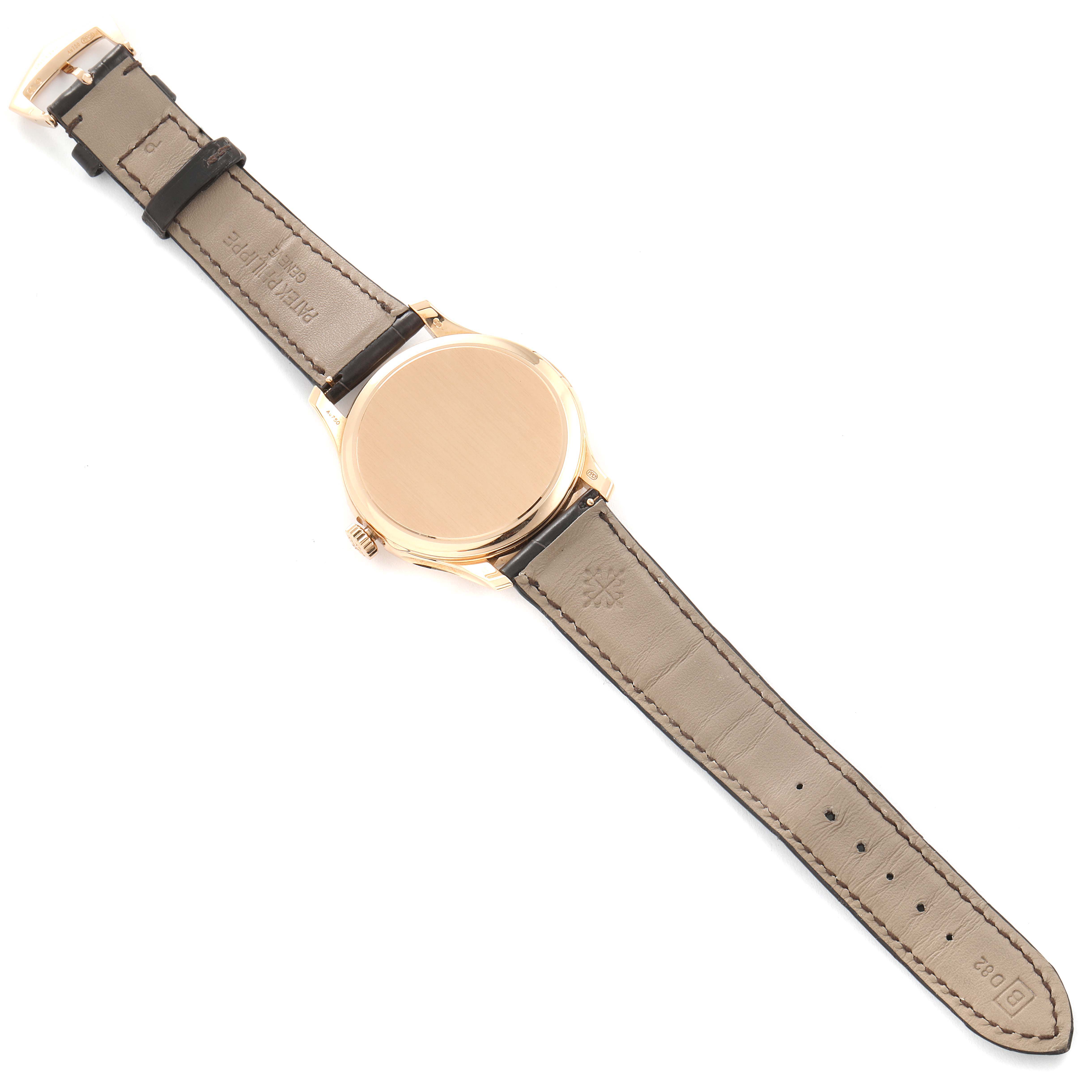 The image shows the back view of a Patek Philippe Calatrava 5227R-001 Men's Rose Gold Beige Dial 5227R-001 Men's Rose Gold Beige Dial watch, highlighting the leather strap and case back.