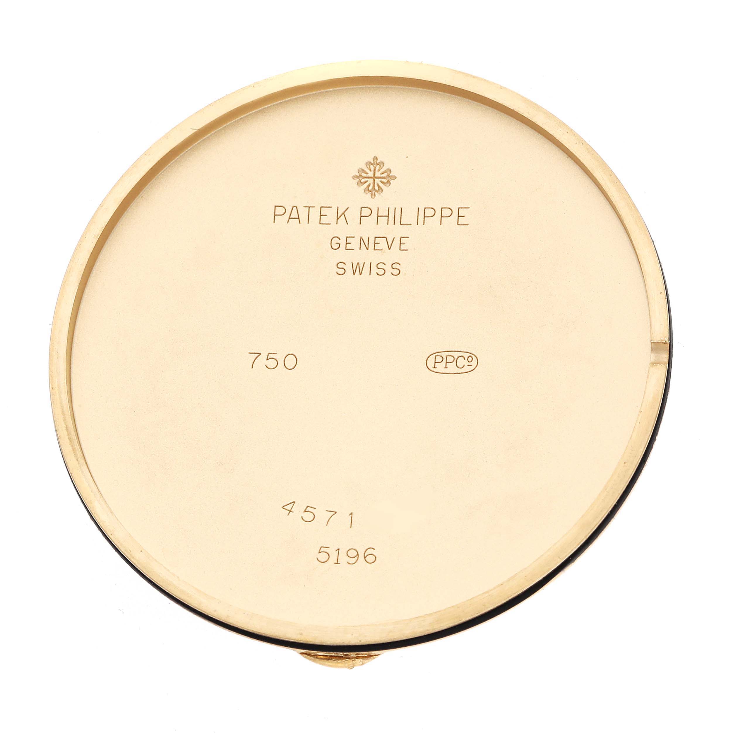The image shows the inside case back of a Patek Philippe Calatrava 5196J, featuring its hallmark and model number.