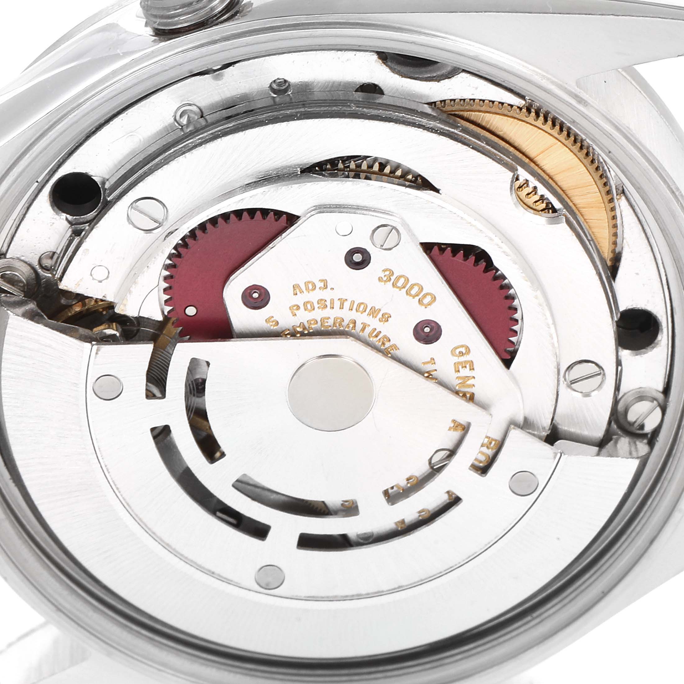 The image shows an internal view of the Rolex Air-King 14000 Men's Stainless Steel Black Dial 14000 Men's Stainless Steel Black Dial watch's movement mechanism from an underside angle.