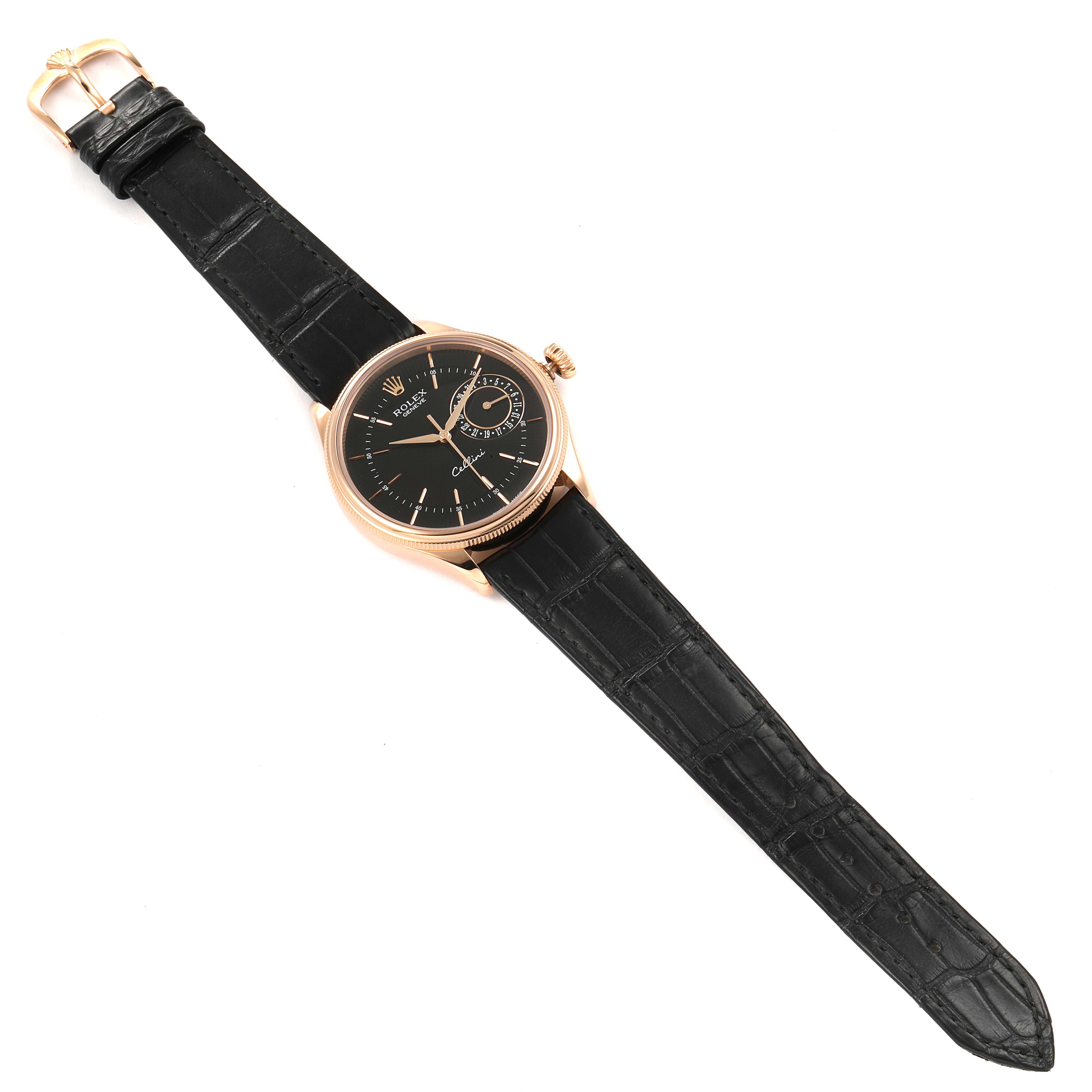 The Rolex Cellini 50515 Men's Rose Gold Black Dial 50515 Men's Rose Gold Black Dial watch is shown from a top-down angle, displaying its black dial, rose gold case, and black leather strap.