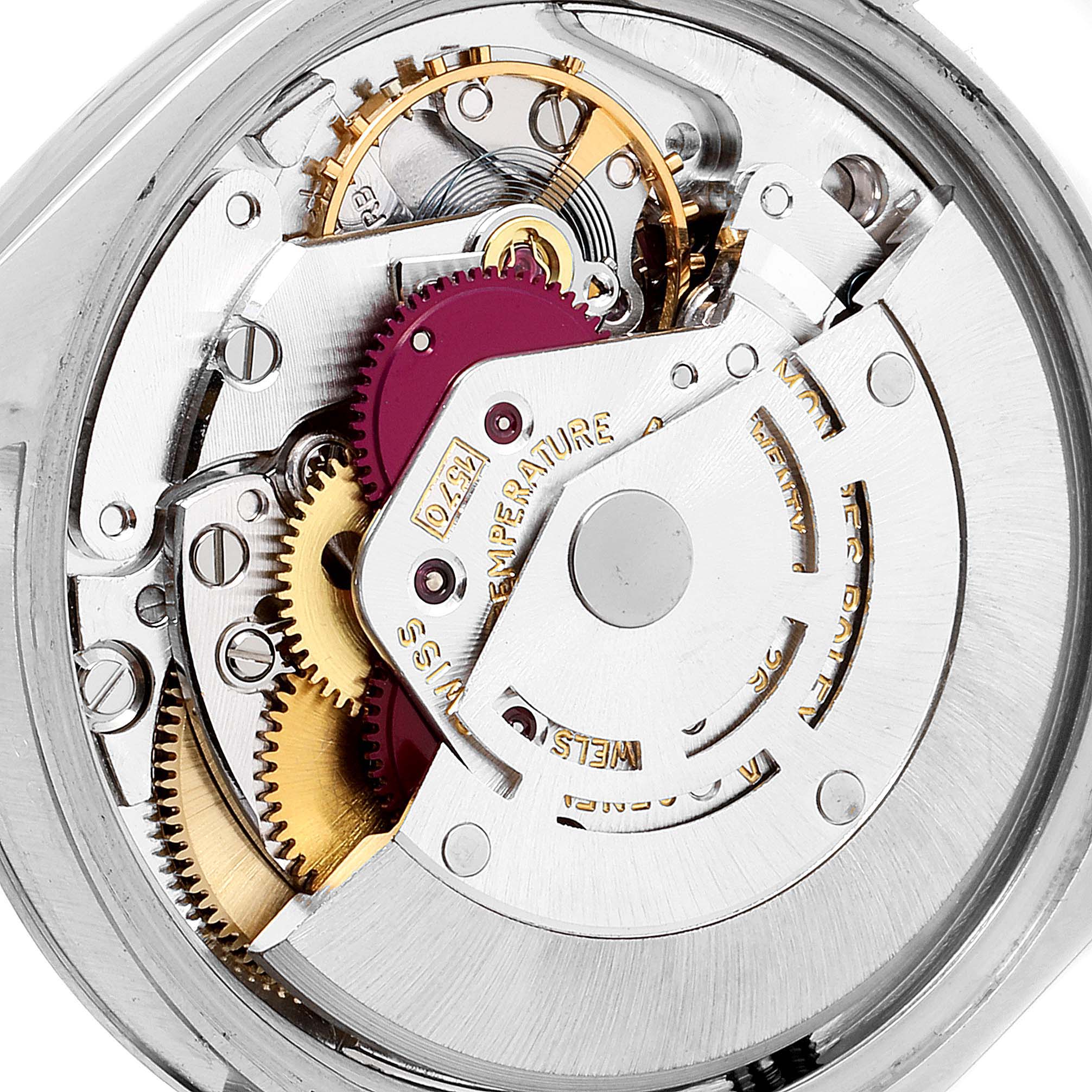 This image shows the internal mechanical movement of a Vintage Collection model Rolex watch from a close-up angle.