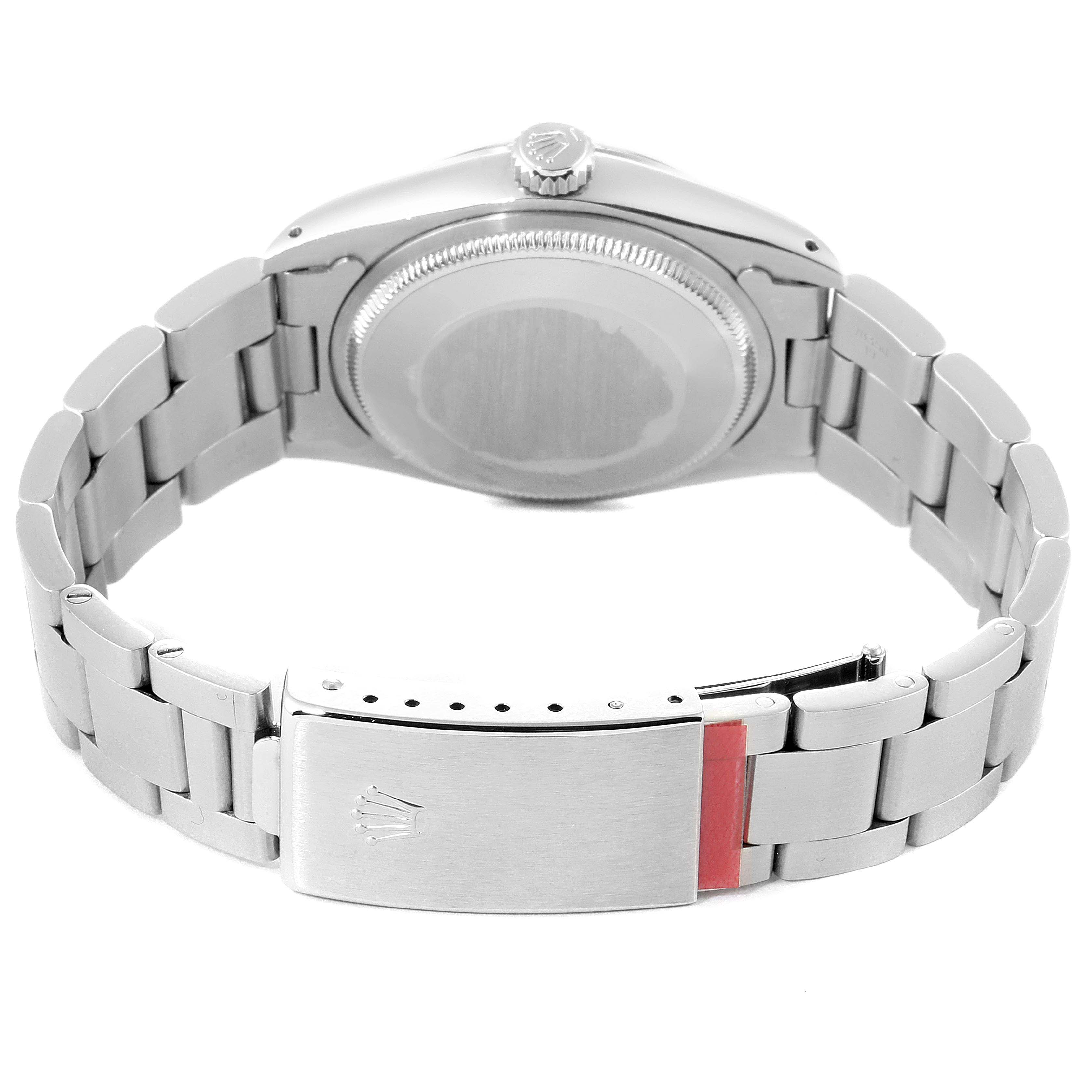 The image shows a rear view of the Rolex Vintage Collection 1500 Men's Stainless Steel Silver Dial 1500 Men's Stainless Steel Silver Dial model, highlighting the back case, crown, and clasp of the bracelet.