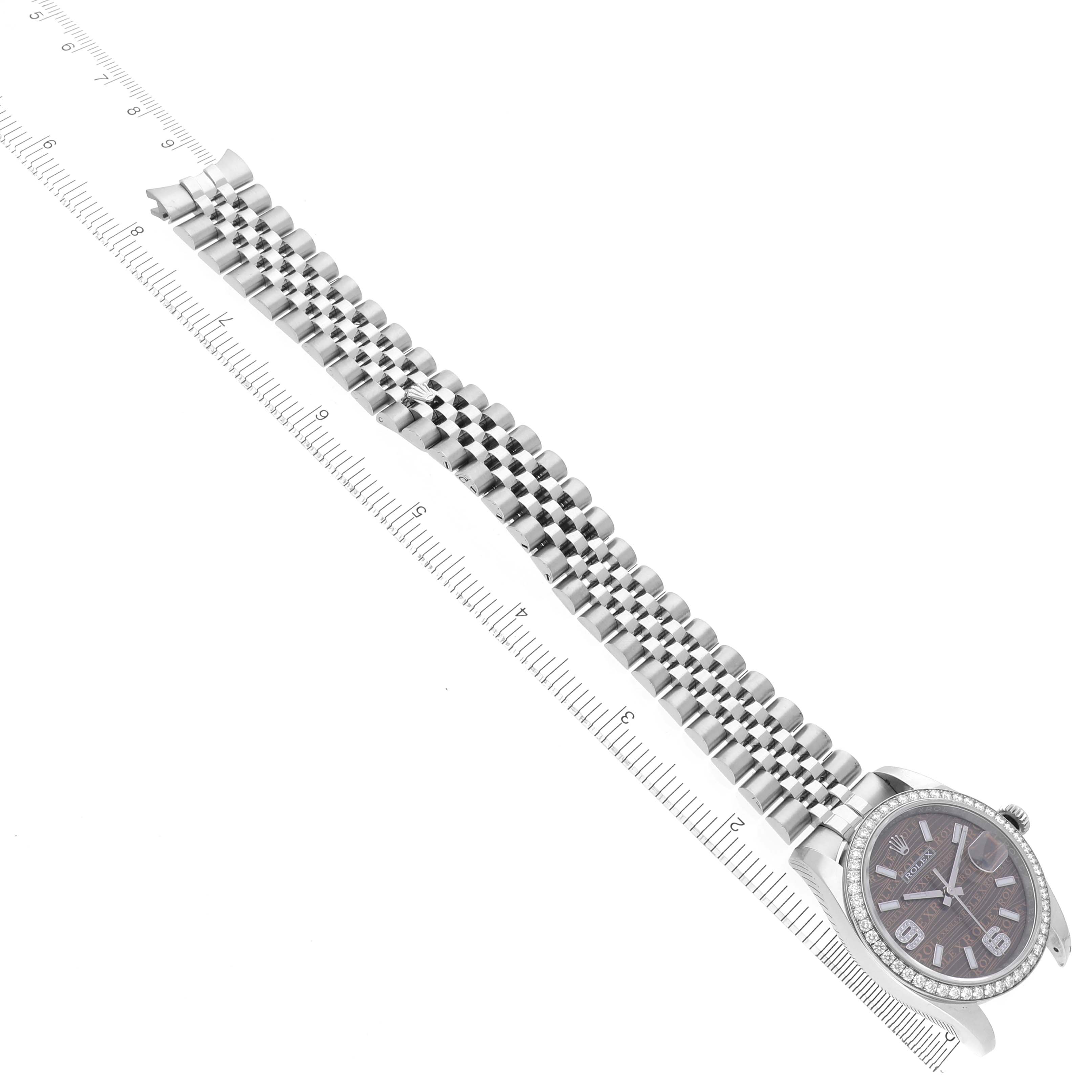 The image shows the full bracelet and face of a Rolex Datejust 116244 Men's Stainless Steel Brown Dial 116244 Men's Stainless Steel Brown Dial watch at a top-down angle, with a ruler for scale.