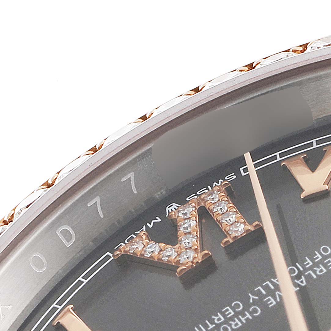The image shows a close-up of the dial and bezel of a Rolex Datejust 126281 Men
s Steel and Gold (two tone) Grey Dial 126281 Men
s Steel and Gold (two tone) Grey Dial watch, highlighting the Roman numeral hour marker and sapphire-studded bezel.