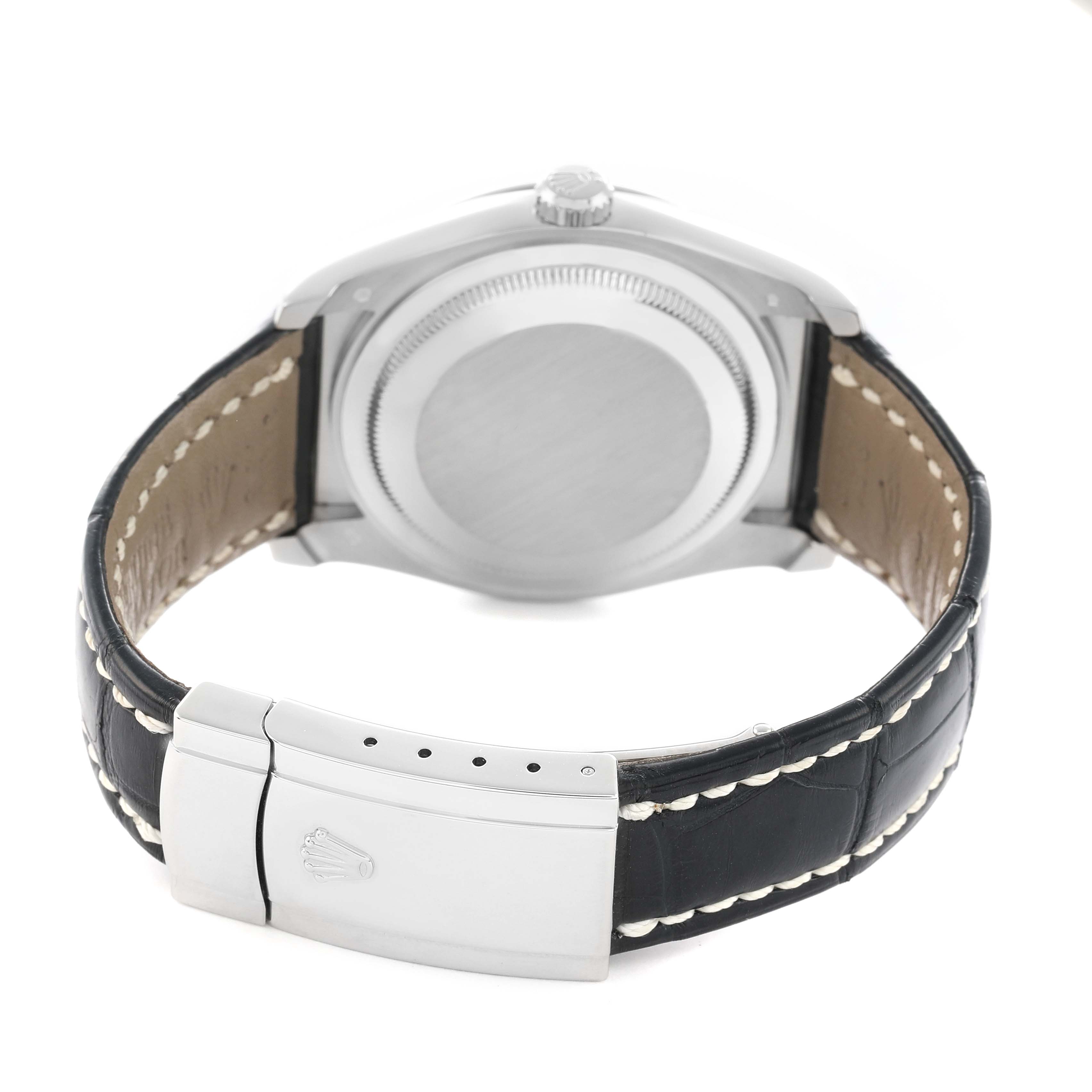 The image shows the back of a Rolex Datejust 116139 Men
s White Gold Black Dial watch with the caseback, crown, and leather strap with a clasp visible.