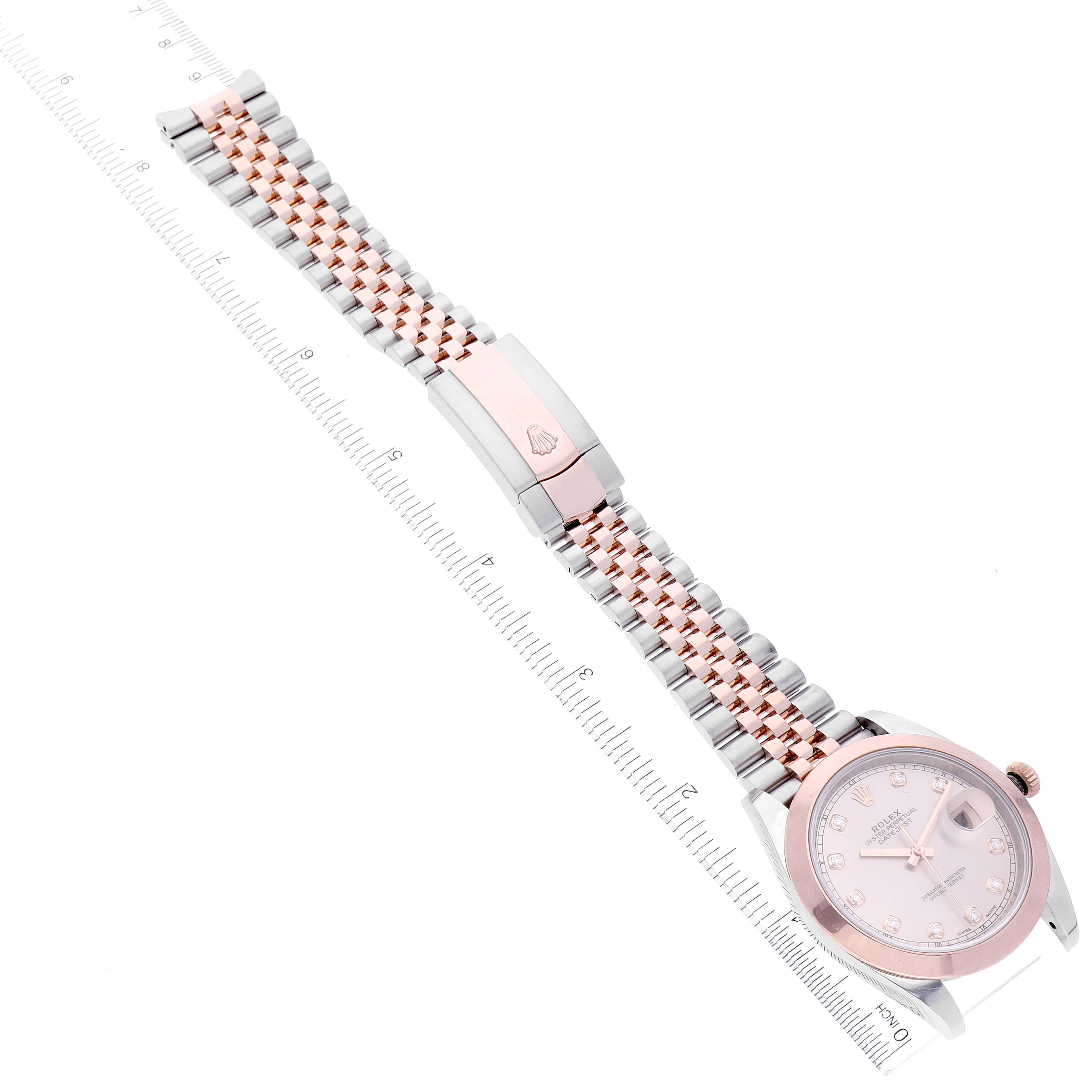 The Rolex Datejust 41 126301 Men's Steel and Gold (two tone) Pink Dial 126301 Men's Steel and Gold (two tone) Pink Dial watch is shown from an above angle, displaying the dial, case, and full bracelet.