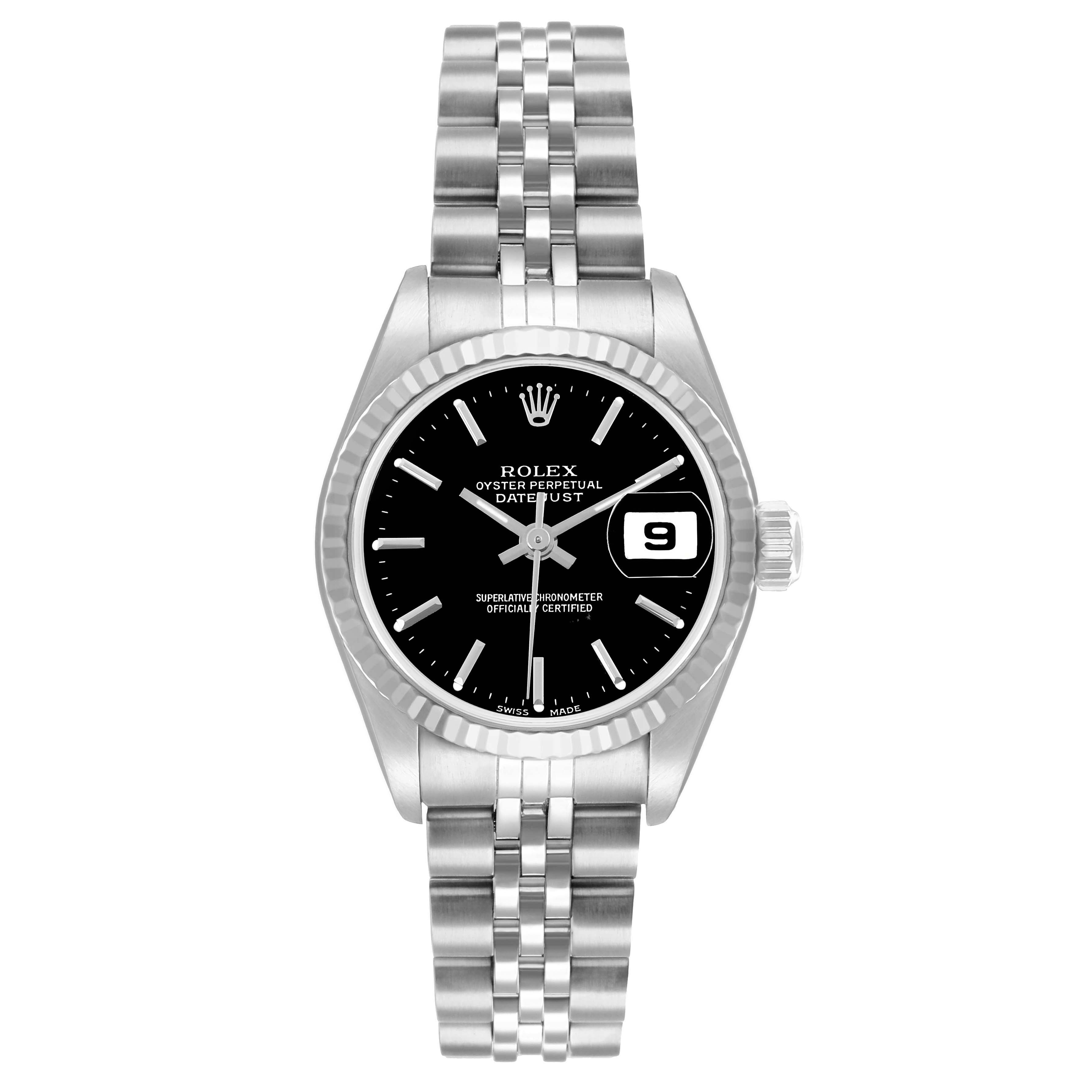 The image shows a front view of a Rolex Datejust 79174 Women
s Stainless Steel Black Dial, displaying the dial, bezel, bracelet, and date window.
