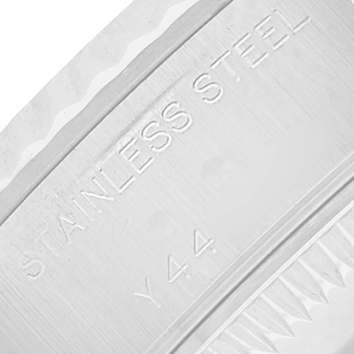 The close-up image shows the engraved words "STAINLESS STEEL" and "Y44" on the side of the Rolex Datejust 79174 Women
s Stainless Steel Black Dial watch case.