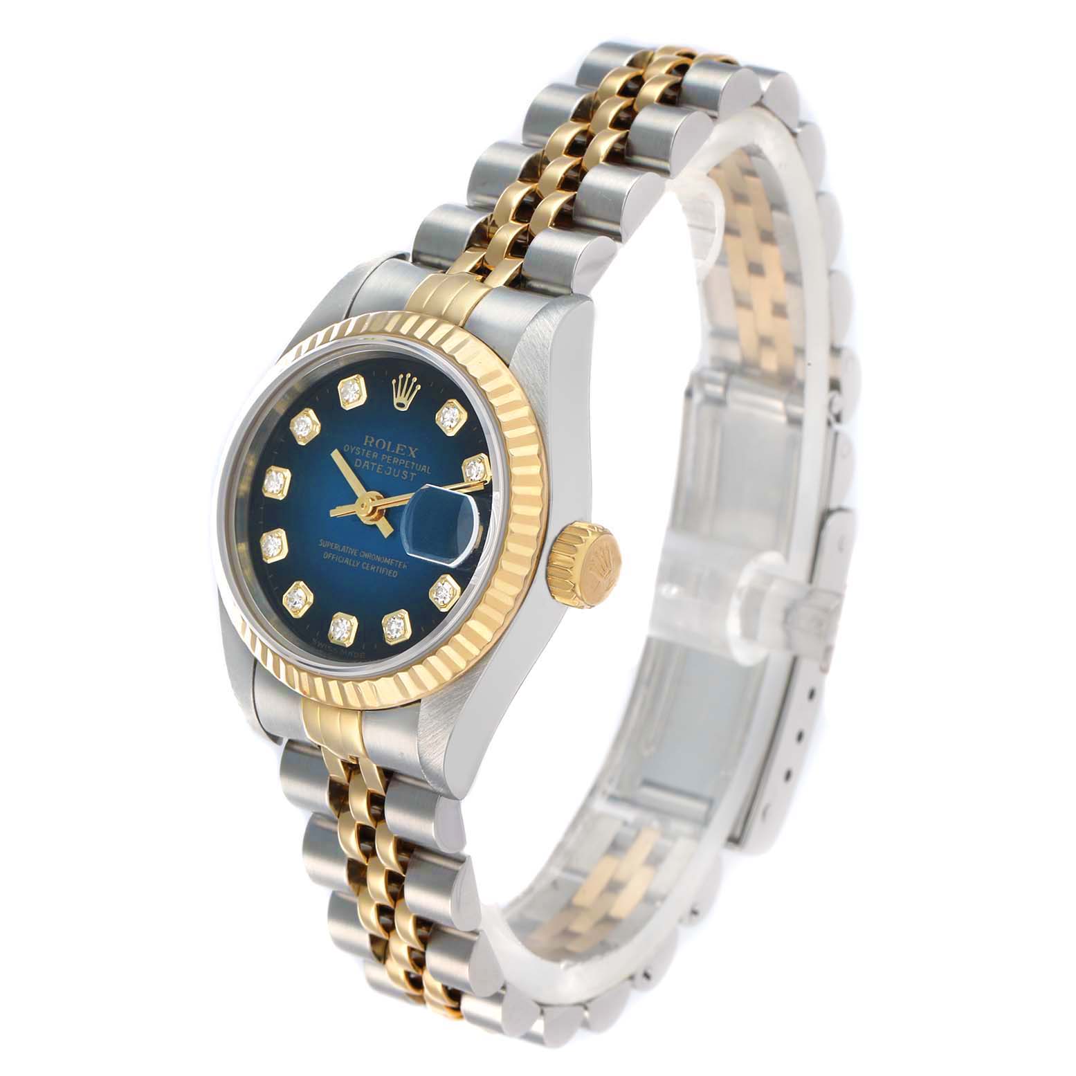 The Rolex Datejust 69173 Men
s Steel and Gold (two tone) Blue Dial model is shown at a three-quarter angle, displaying the blue dial, gold bezel, and two-tone bracelet.