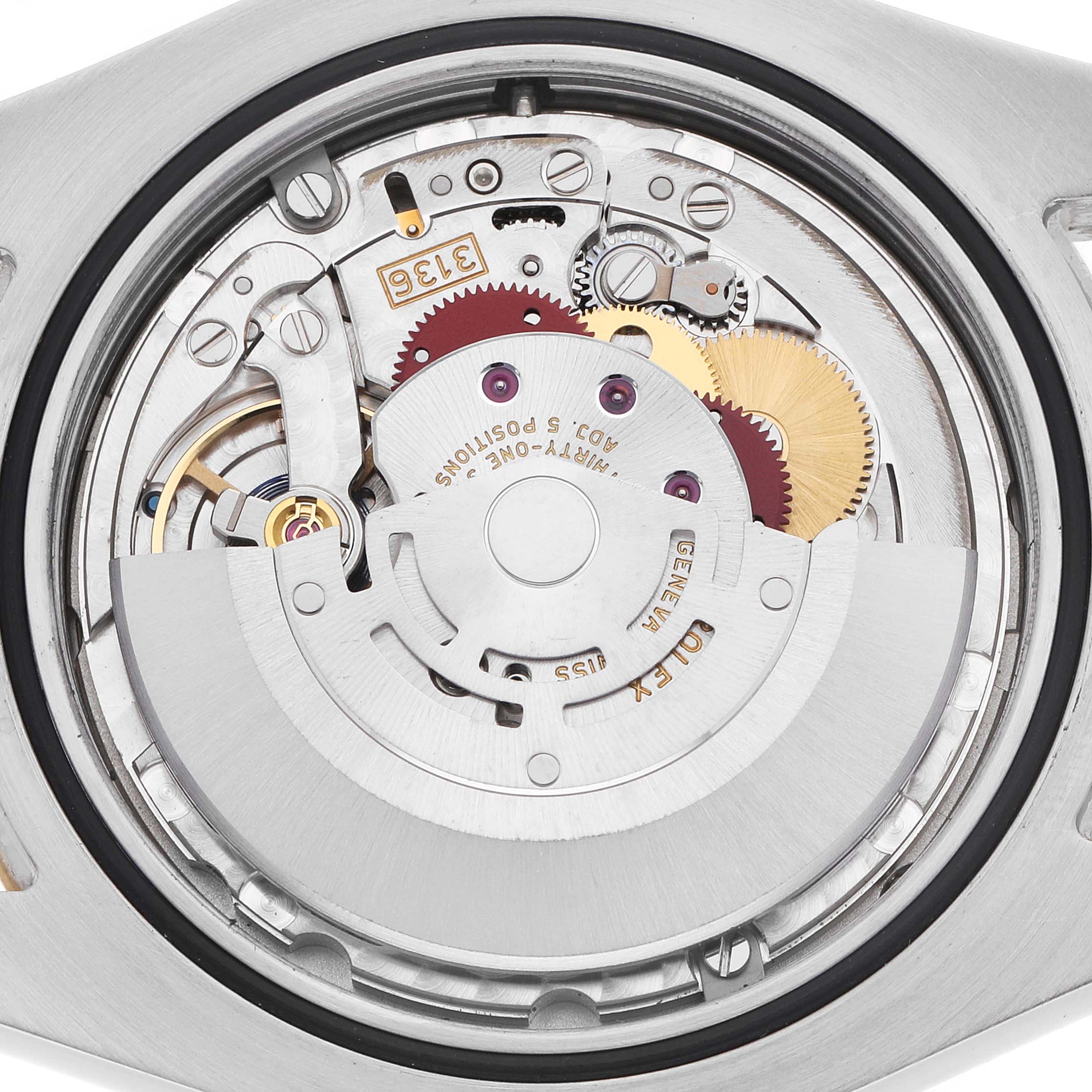 The image shows the back view of a Rolex Datejust 41 116333 Men
s Steel and Gold (two tone) Champagne Dial, highlighting its movement and internal mechanism.