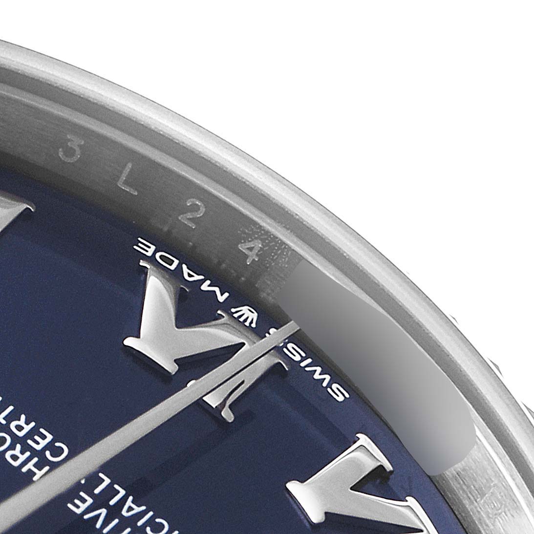 This image shows a close-up angle of the Rolex Mid-Size 278274 Women
s Stainless Steel Blue Dial 278274 Women
s Stainless Steel Blue Dial watch
s dial, including the hands and some hour markers.