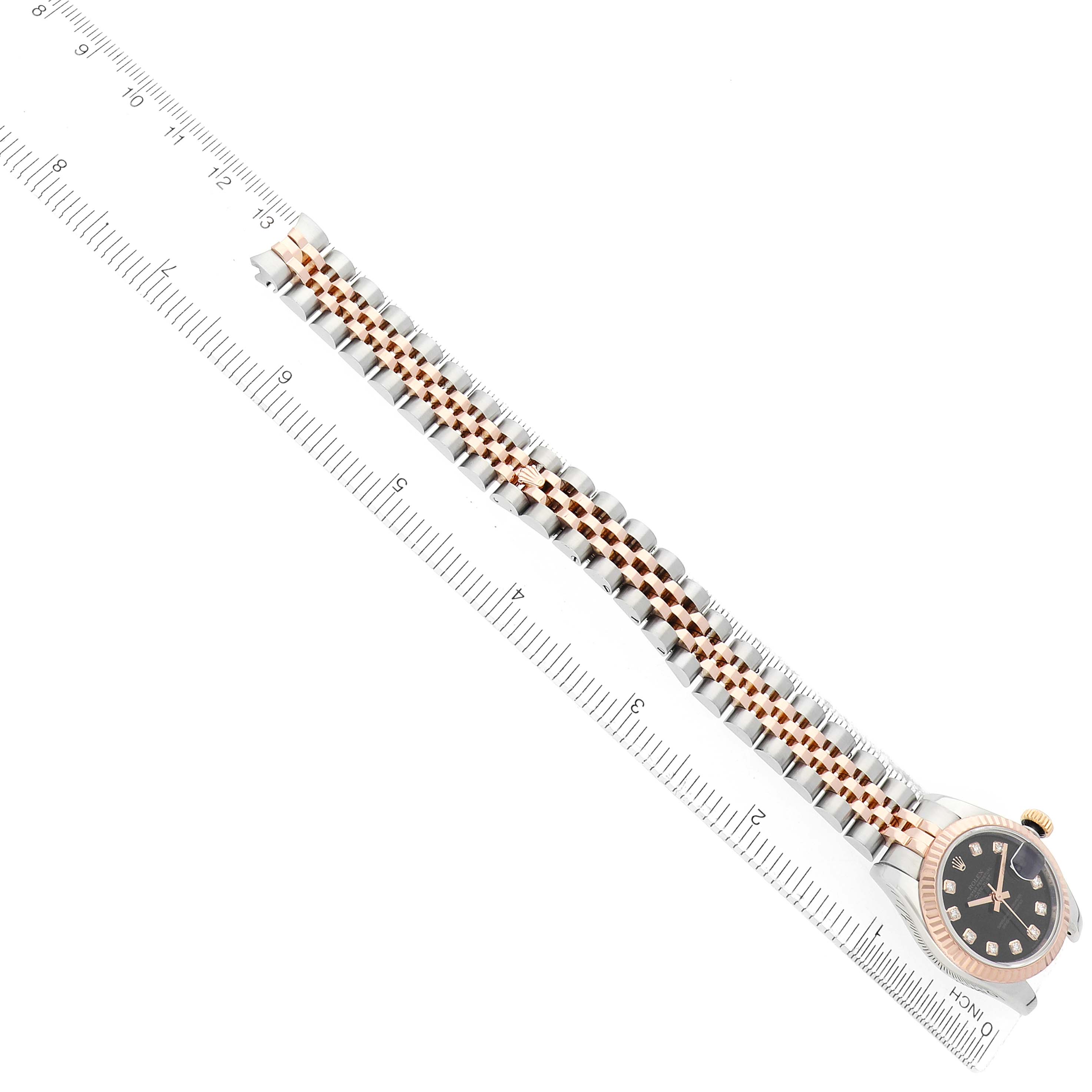 The Rolex Datejust 179171 Women
s Steel and Gold (two tone) Black Dial watch is shown from a top view, highlighting its dial, bezel, and two-tone bracelet.