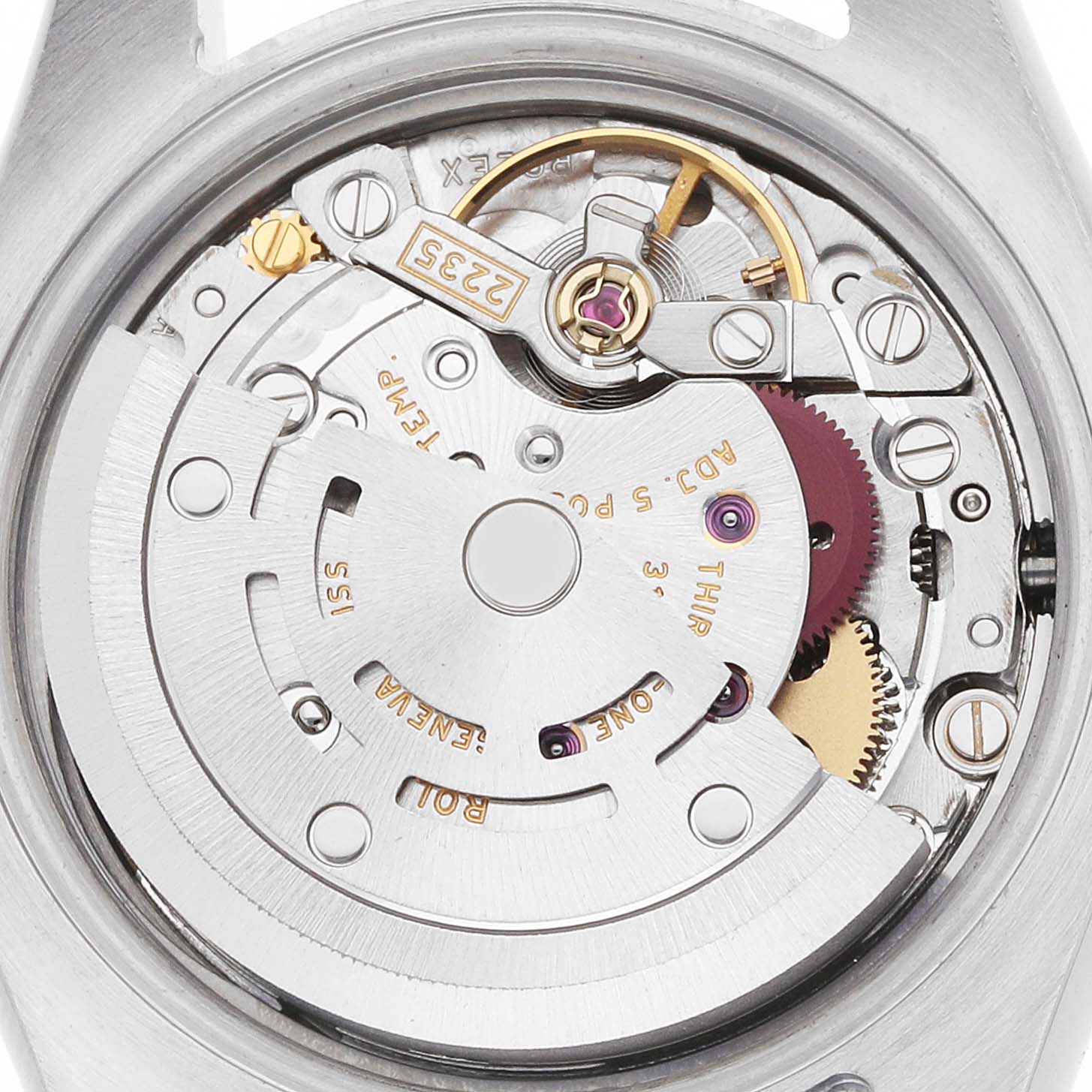 The image shows a close-up of the Rolex Datejust 179171 Women
s Steel and Gold (two tone) Black Dial watch movement from the back, highlighting gears and the rotor.