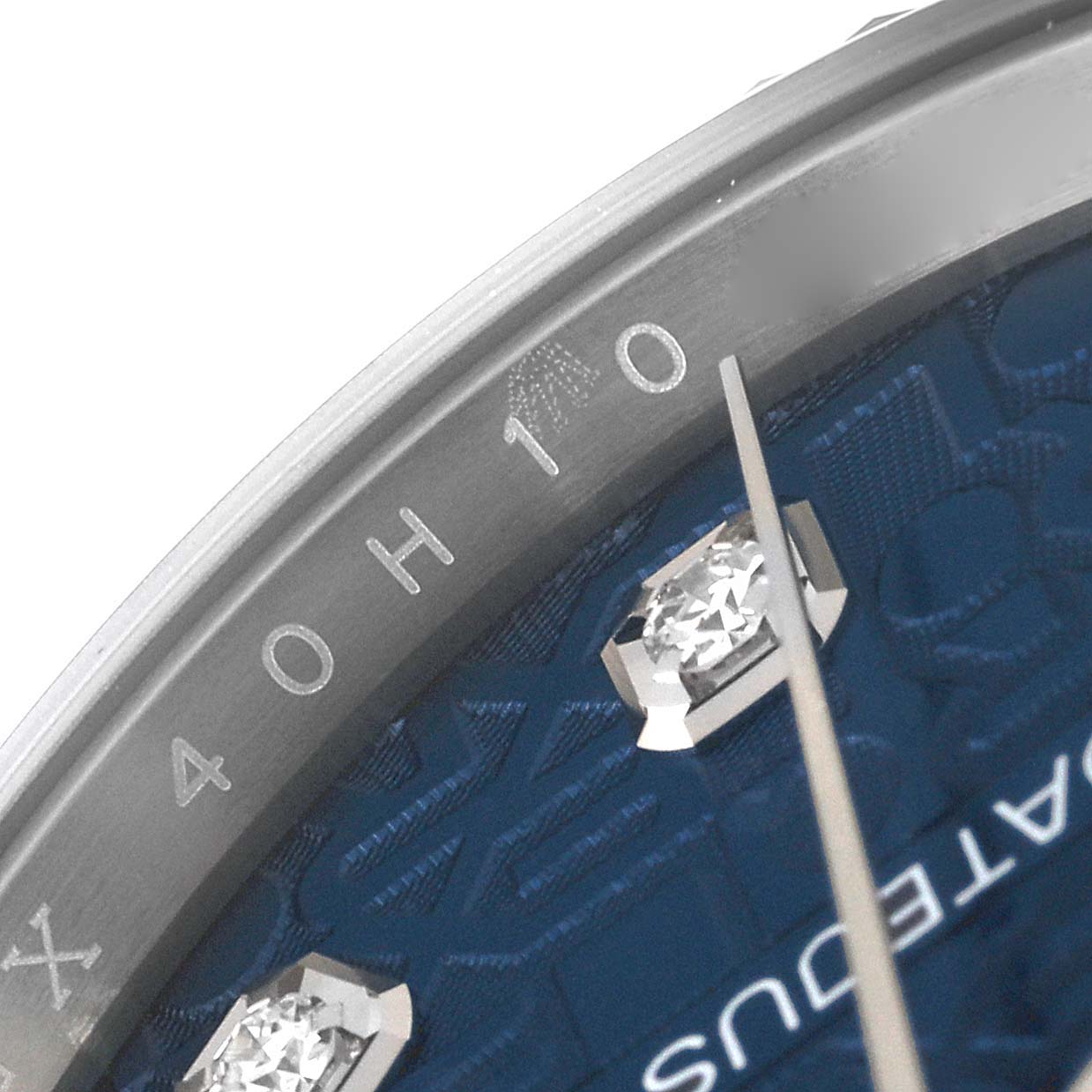 The image shows a close-up angle of the Rolex Datejust 126234 Men's Stainless Steel Blue Dial 126234 Men's Stainless Steel Blue Dial watch face, highlighting the dial, indices, and hands.