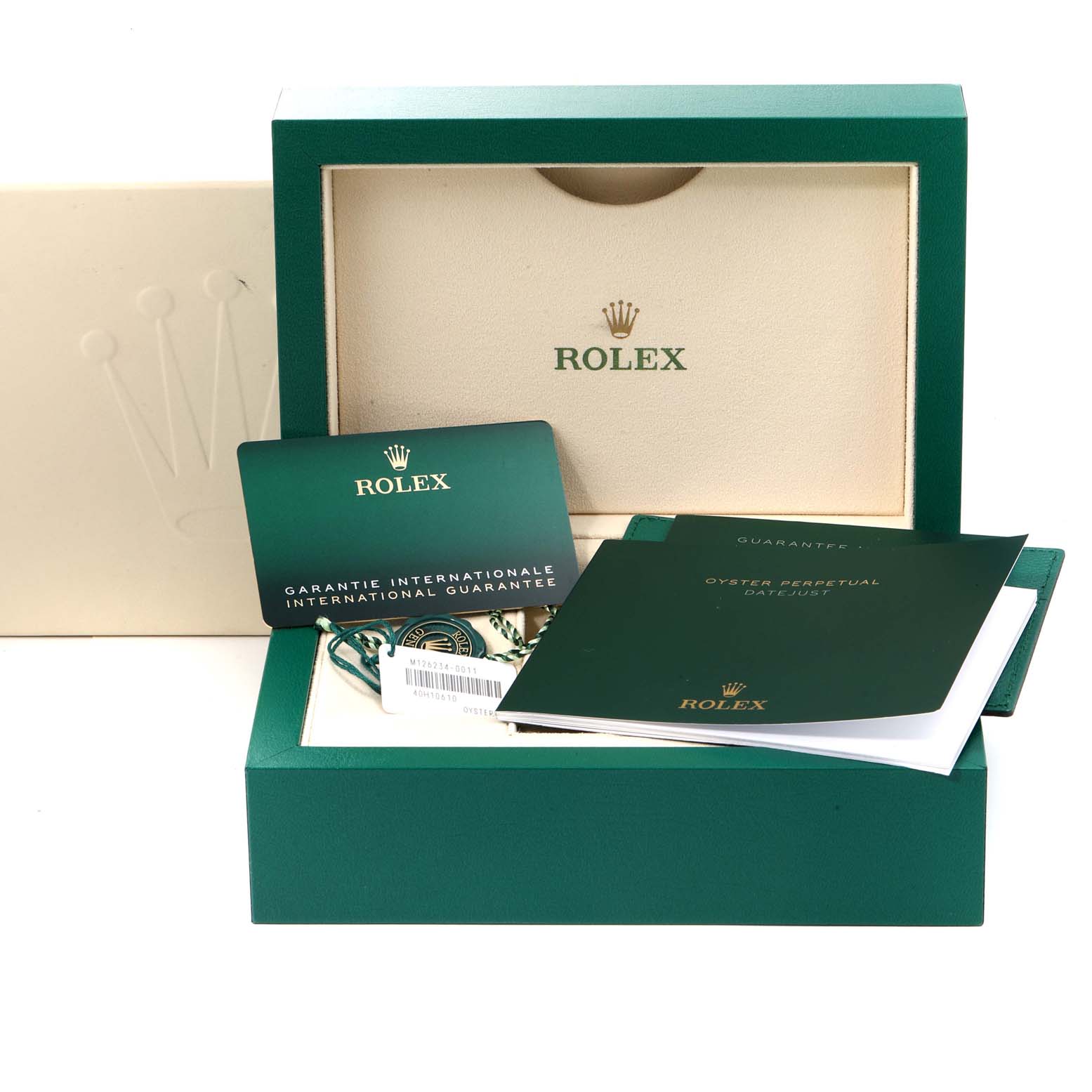 The image shows a Rolex Datejust 126234 Men's Stainless Steel Blue Dial 126234 Men's Stainless Steel Blue Dial's green box, international guarantee card, manuals, and tags viewed from the front.