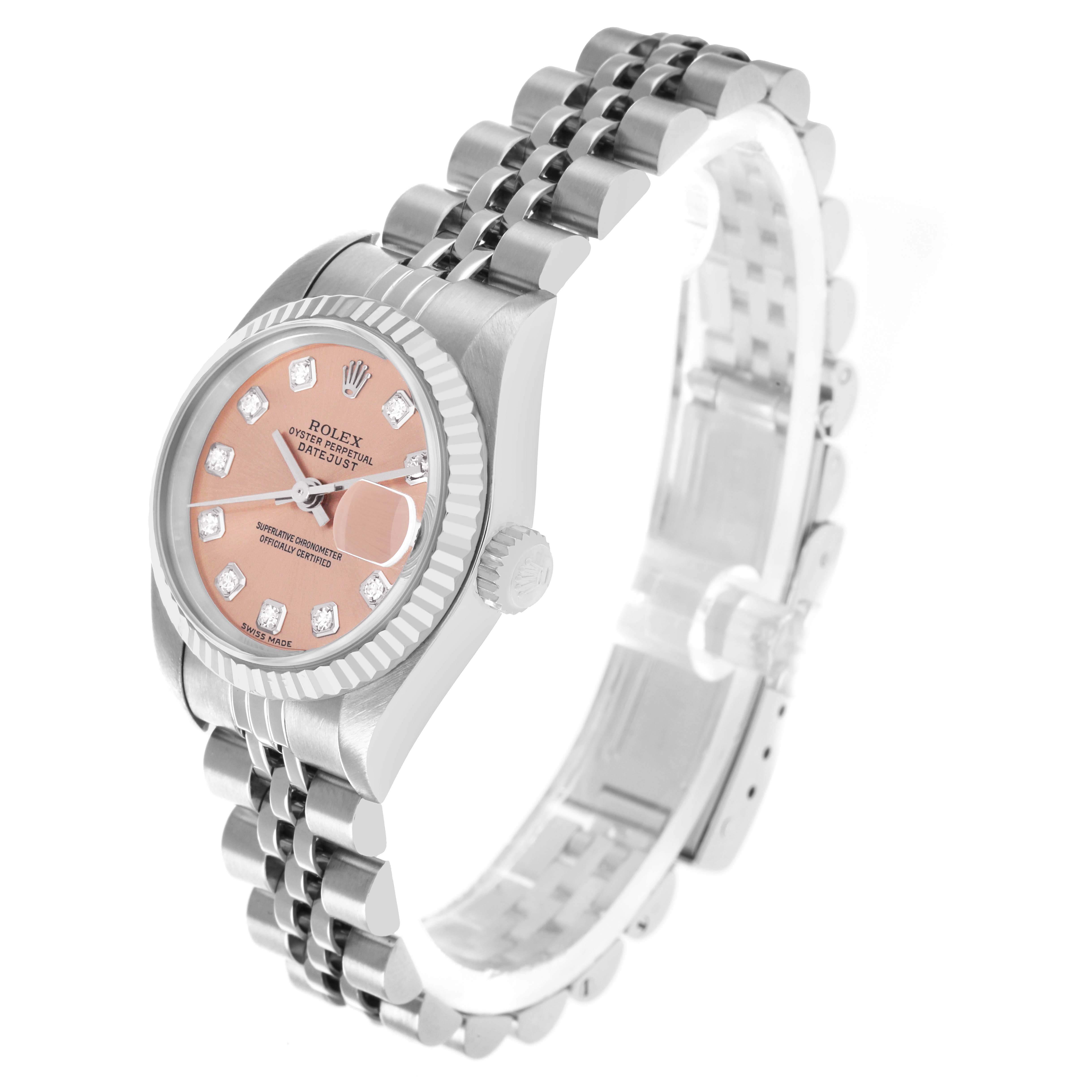 The Rolex Datejust 79174 Men
s Stainless Steel Pink Dial watch is shown at a three-quarter angle, highlighting the face, bezel, crown, and bracelet.