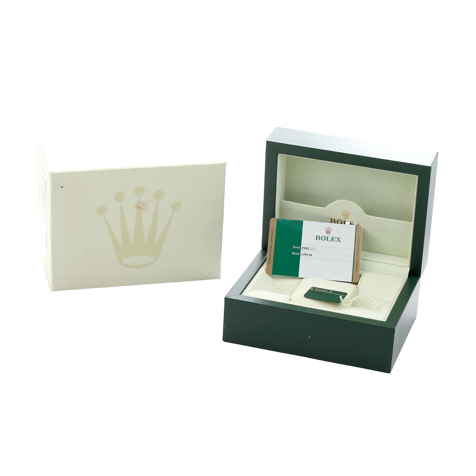 The image shows a Rolex Datejust 179174 Women
s Stainless Steel Silver Dial box and packaging with an open lid, displaying documentation and a tag inside.