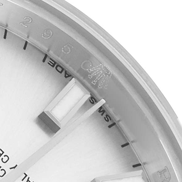 The image shows a close-up of the Rolex Datejust 179174 Women
s Stainless Steel Silver Dial watch face, highlighting the indices, partial numbers, and part of the logo.