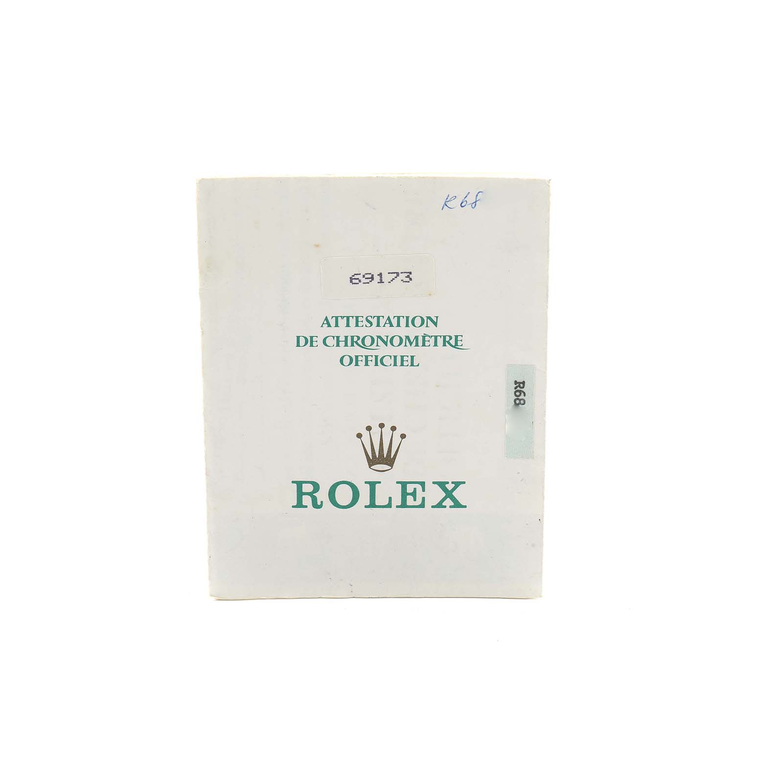 The image shows a front view of a Rolex Datejust 69173 Women
s Steel and Gold (two tone) Silver Dial certification booklet with branding and identification numbers.