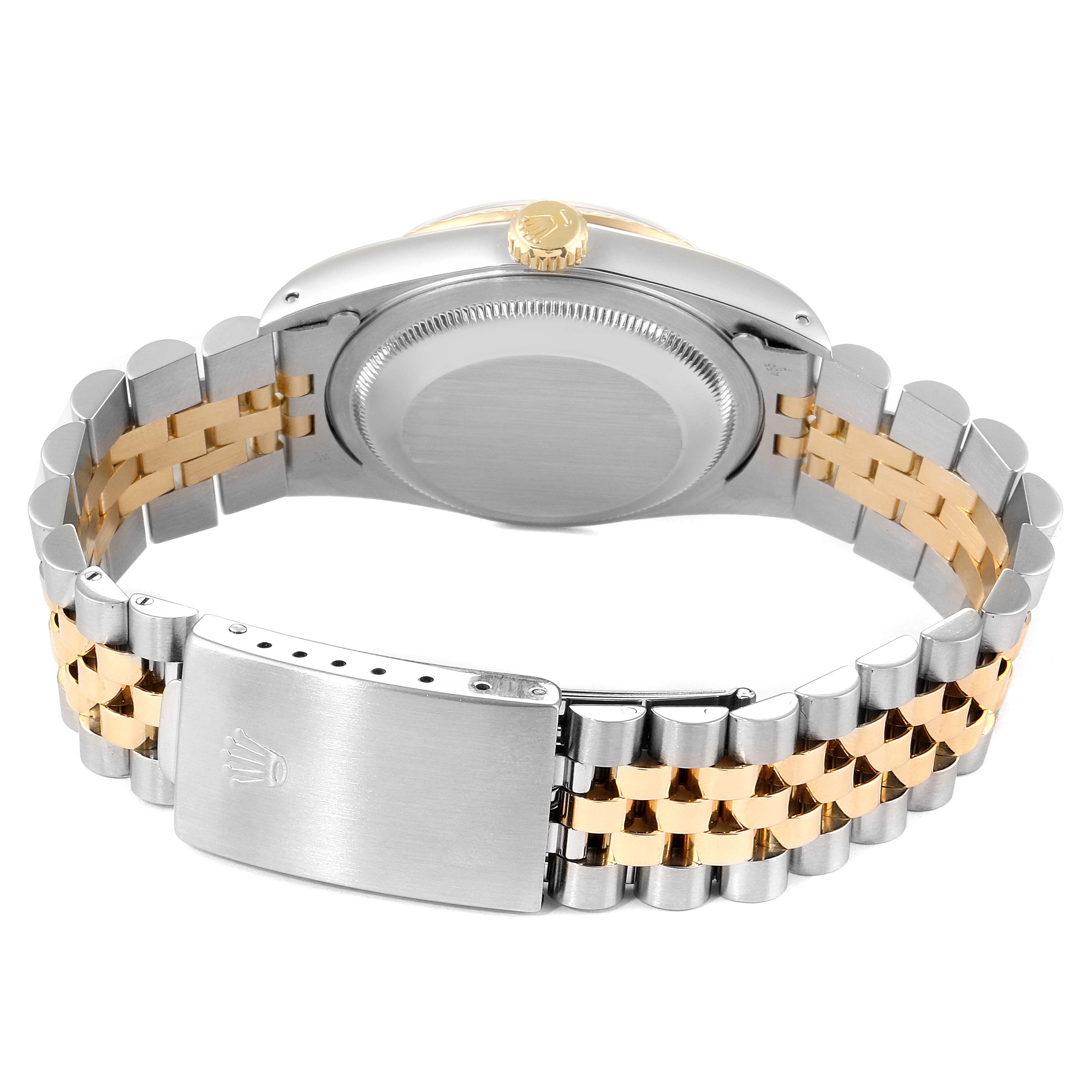 The image shows the back of a Rolex Datejust 16233 Men's Steel and Gold (two tone) Blue Dial 16233 Men's Steel and Gold (two tone) Blue Dial watch, focusing on the bracelet, clasp, and case back.