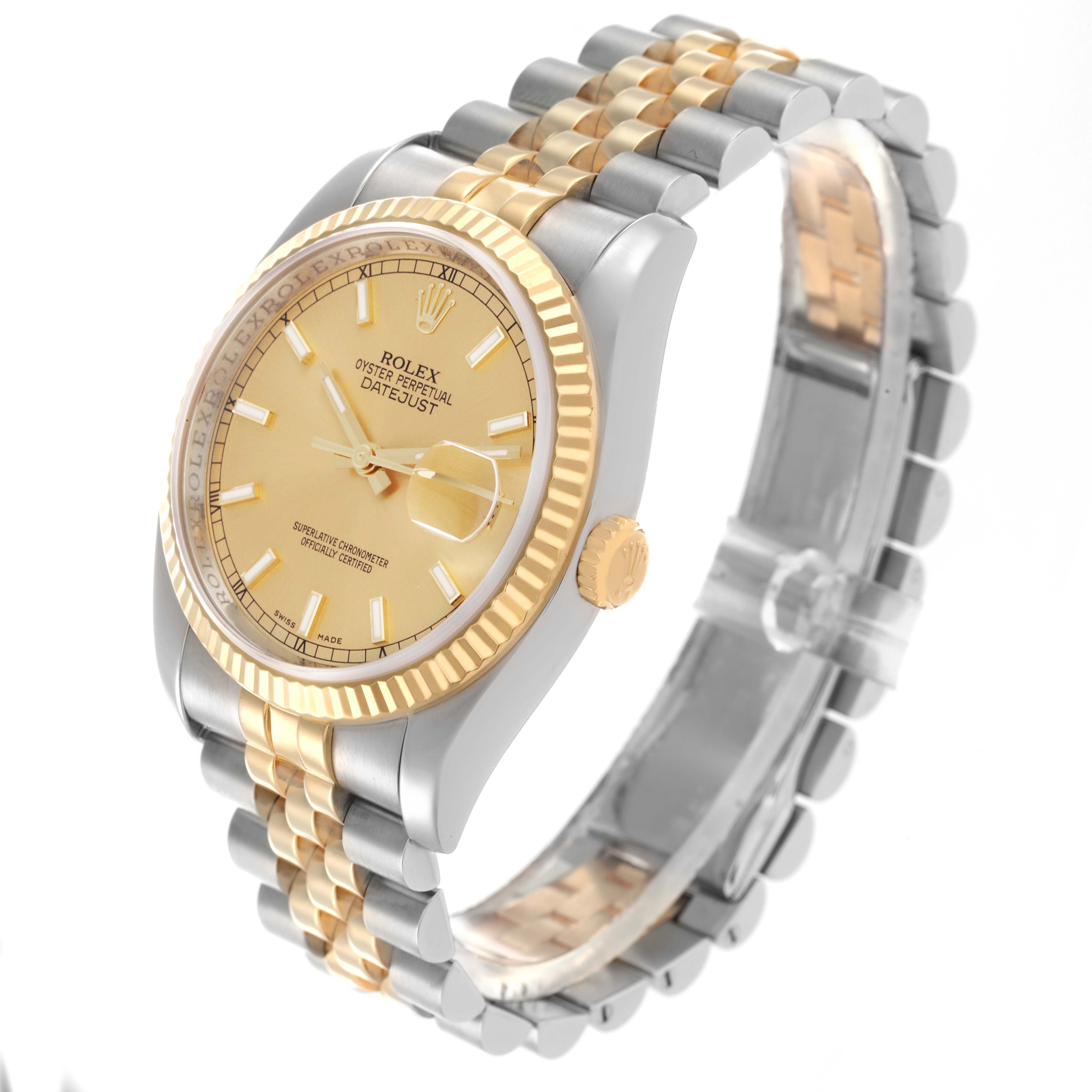 The Rolex Datejust 116233 Men
s Steel and Gold (two tone) Champagne Dial watch is shown at a slight angle, highlighting its gold bezel, jubilee bracelet, and crown.