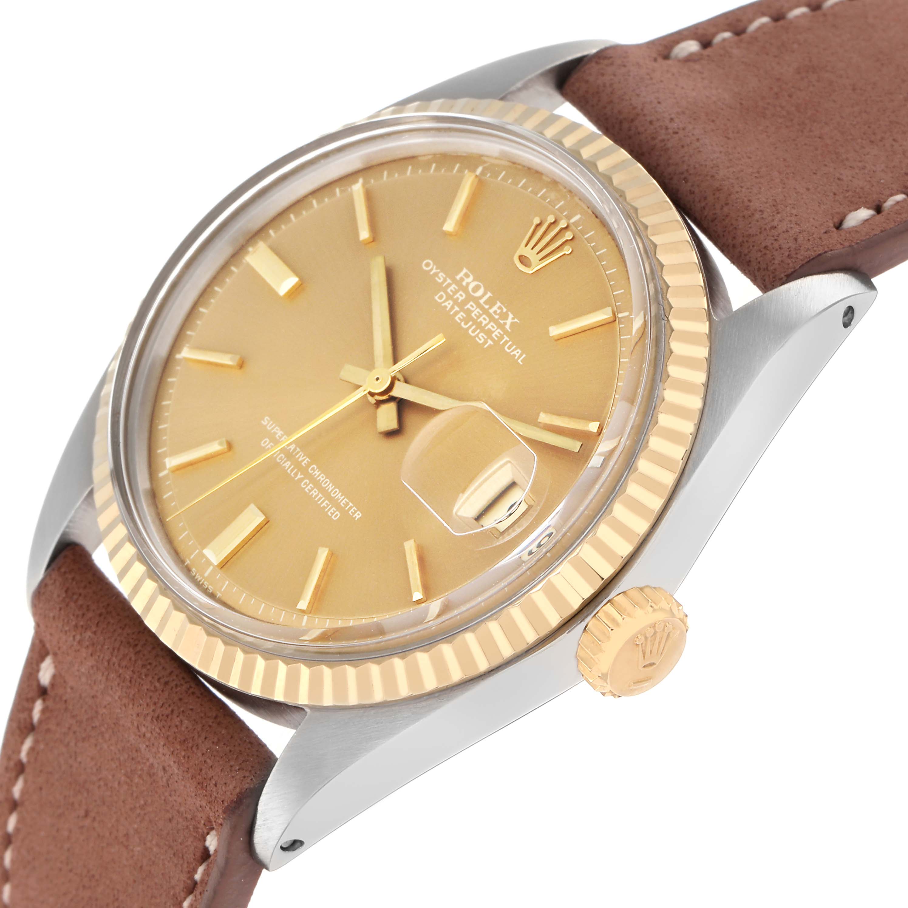 The Rolex Vintage Collection 16013 Men
s Steel and Gold (two tone) Champagne Dial watch is shown at an angle highlighting the dial, bezel, crown, and part of the leather strap.