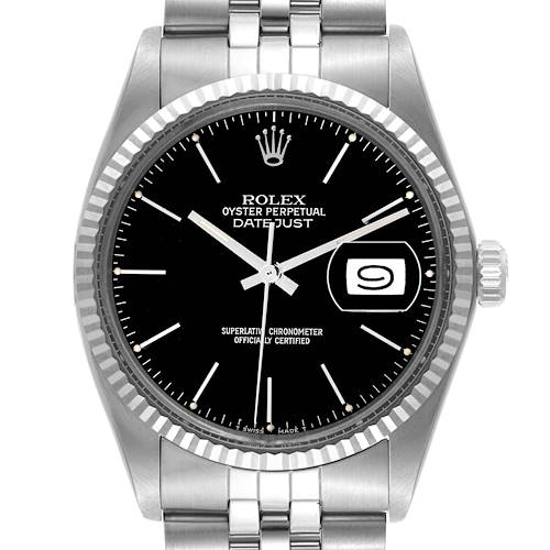 The image shows a front view of a Rolex Vintage Collection watch, showcasing its black dial, date window, and metal bracelet.