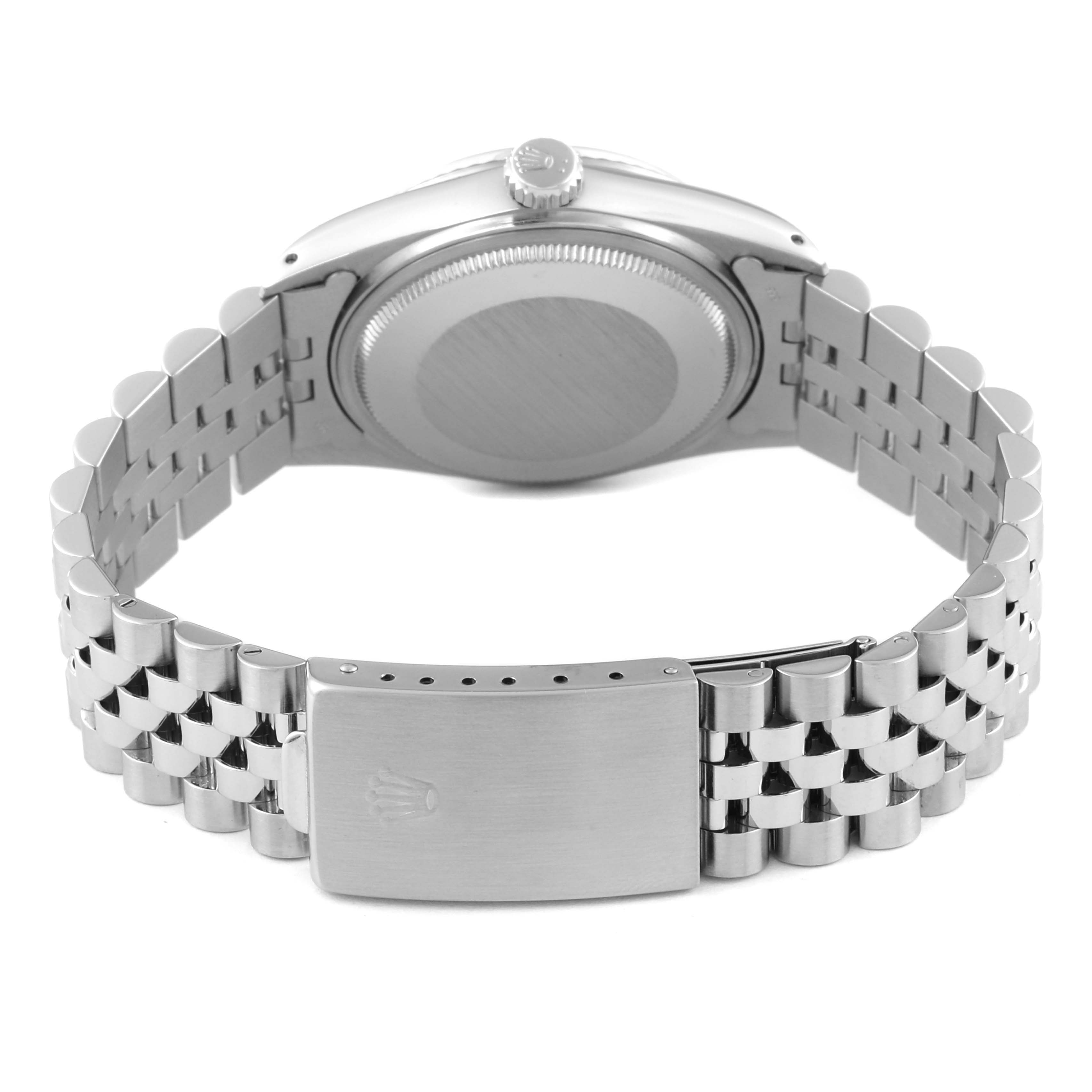 The image shows the back of a Vintage Collection Rolex watch, including the case, crown, and bracelet clasp.