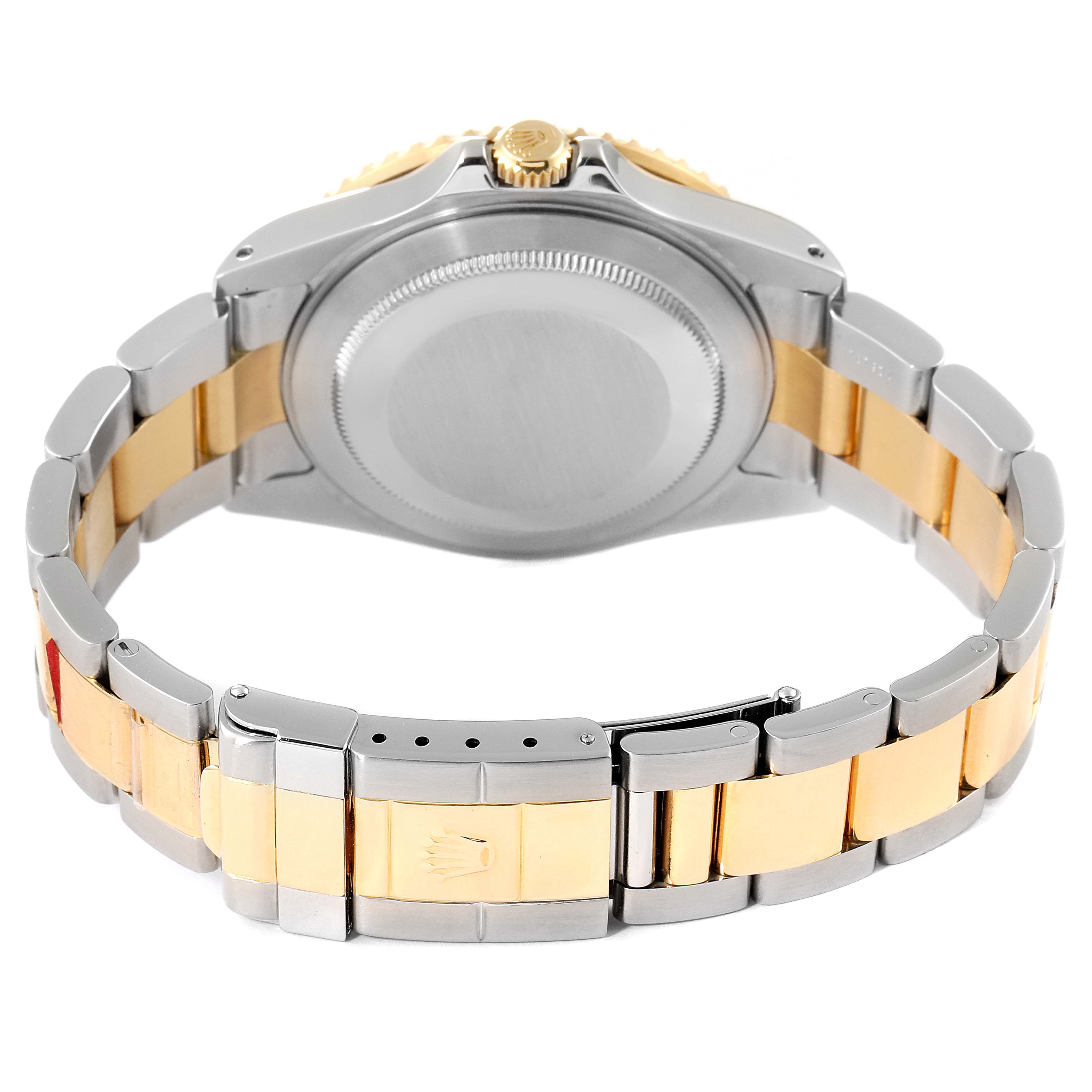 The image shows the back case and bracelet of a Rolex GMT-Master 16713 Men's Steel and Gold (two tone) Black Dial 16713 Men's Steel and Gold (two tone) Black Dial watch, highlighting the bi-metal design.