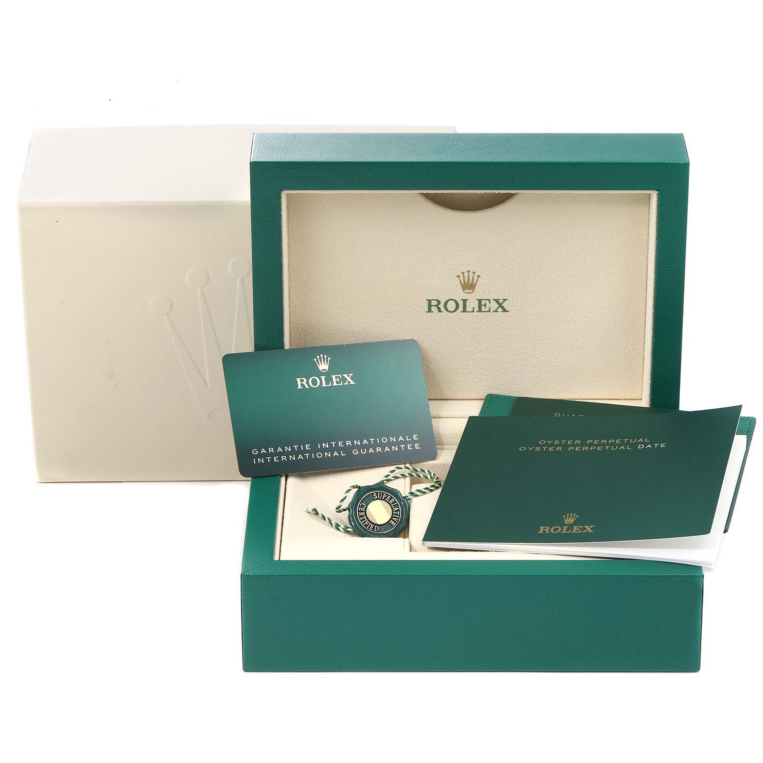 The image shows the packaging, international guarantee card, and manuals for a Rolex Oyster Perpetual 124200 Men's Stainless Steel Blue Dial 124200 Men's Stainless Steel Blue Dial watch.