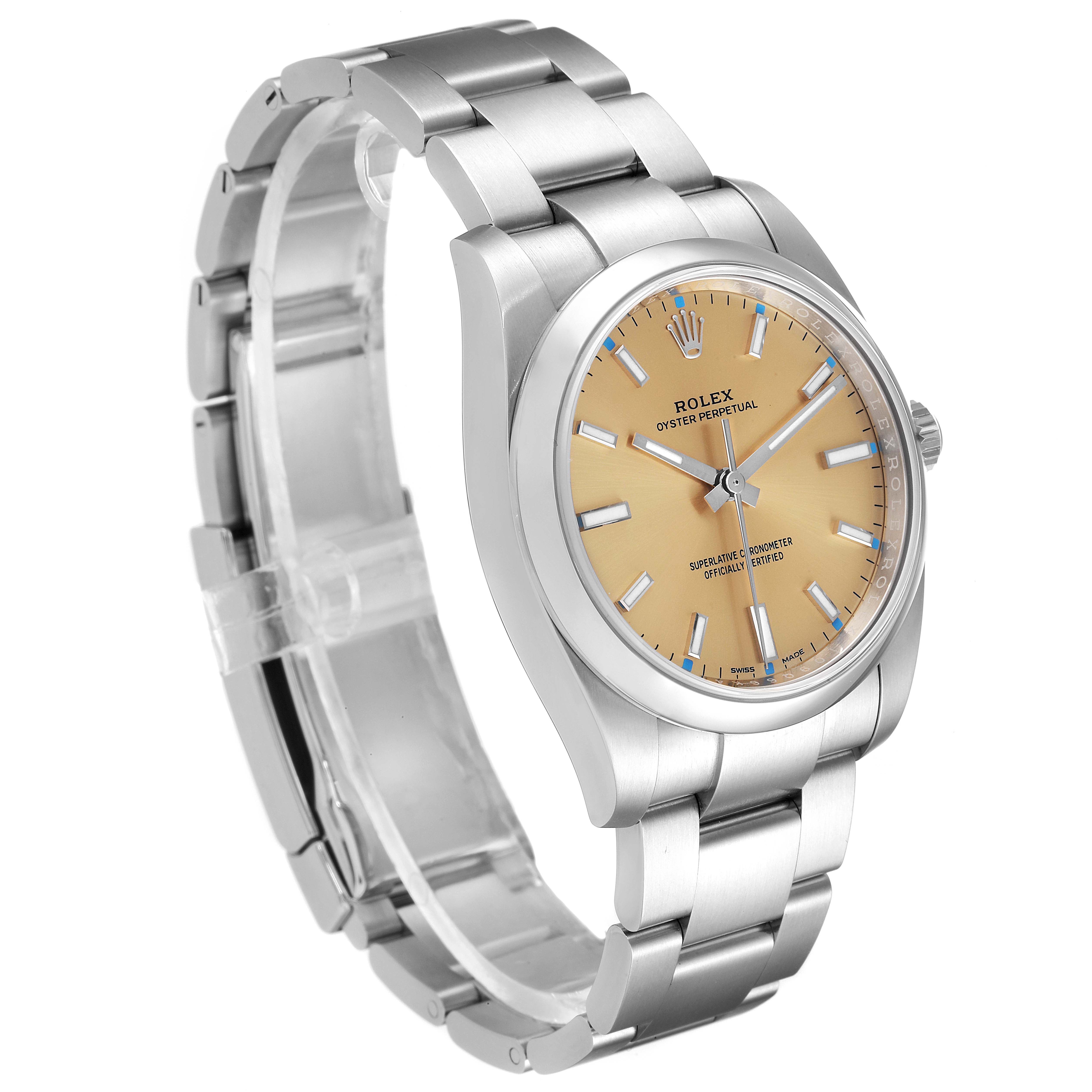 The image shows a side angle of a Rolex Oyster Perpetual 114200 Men's Stainless Steel Champagne Dial 114200 Men's Stainless Steel Champagne Dial watch, highlighting the dial, case, and bracelet.