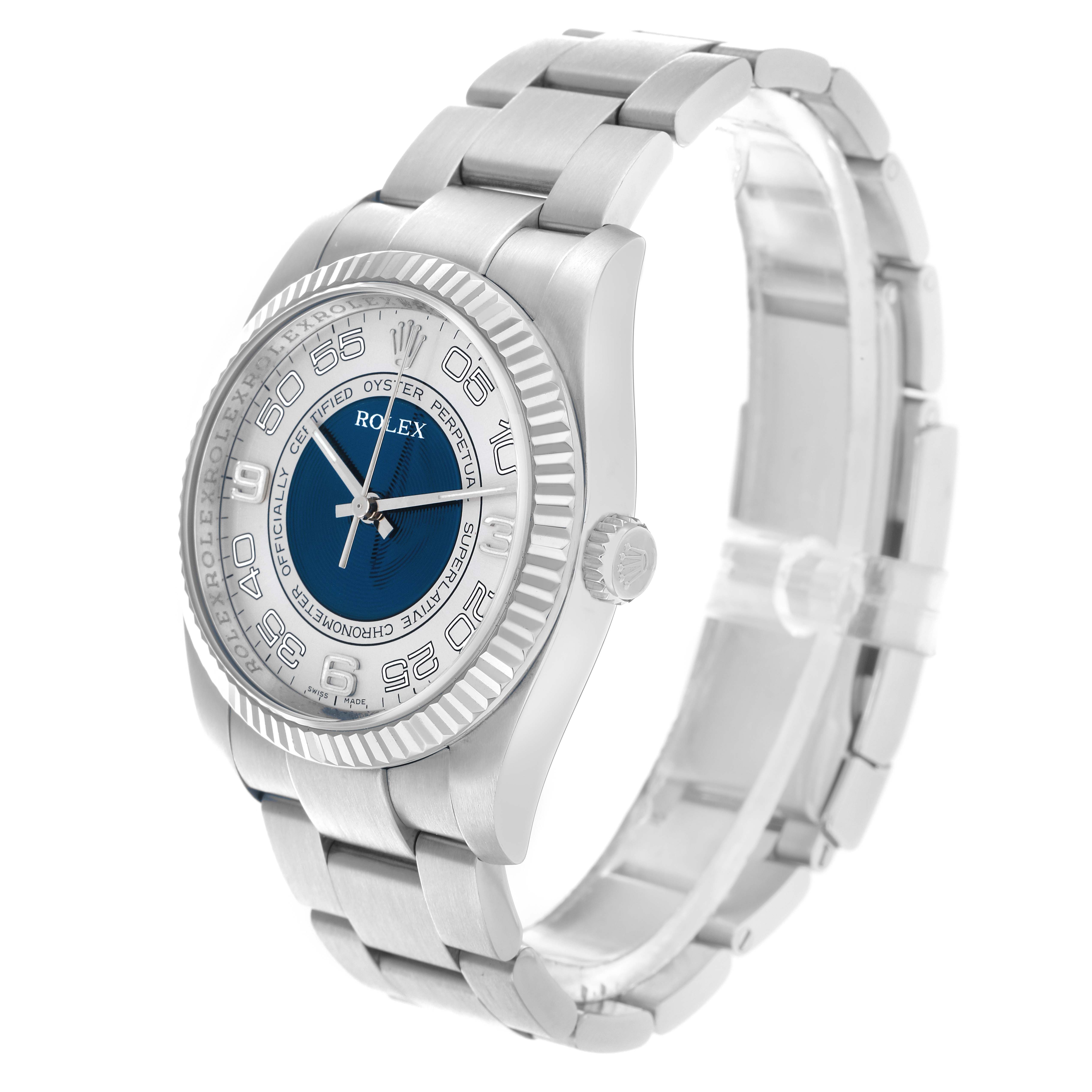 The Rolex Oyster Perpetual 116034 Men
s Stainless Steel Blue Dial watch is shown at a three-quarter angle, highlighting the face, bezel, and bracelet.