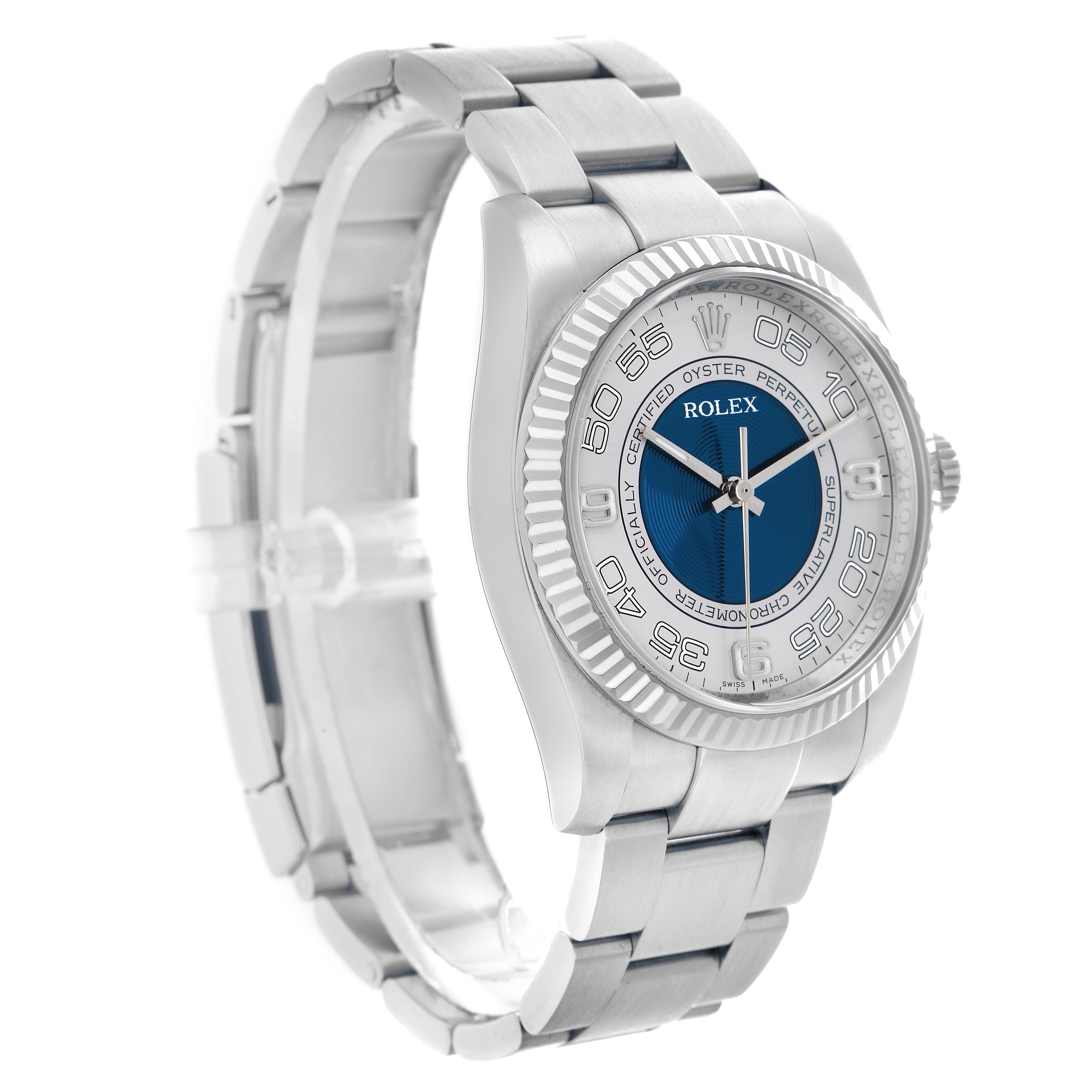 The Rolex Oyster Perpetual 116034 Men
s Stainless Steel Blue Dial watch is shown at a slight angle, highlighting the face, bezel, and part of the bracelet.