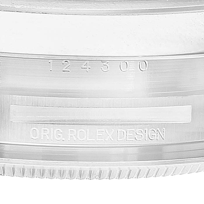 The image shows the side of the case with model engravings of the Rolex Oyster Perpetual 124300 Men's Stainless Steel Silver Dial 124300 Men's Stainless Steel Silver Dial watch.