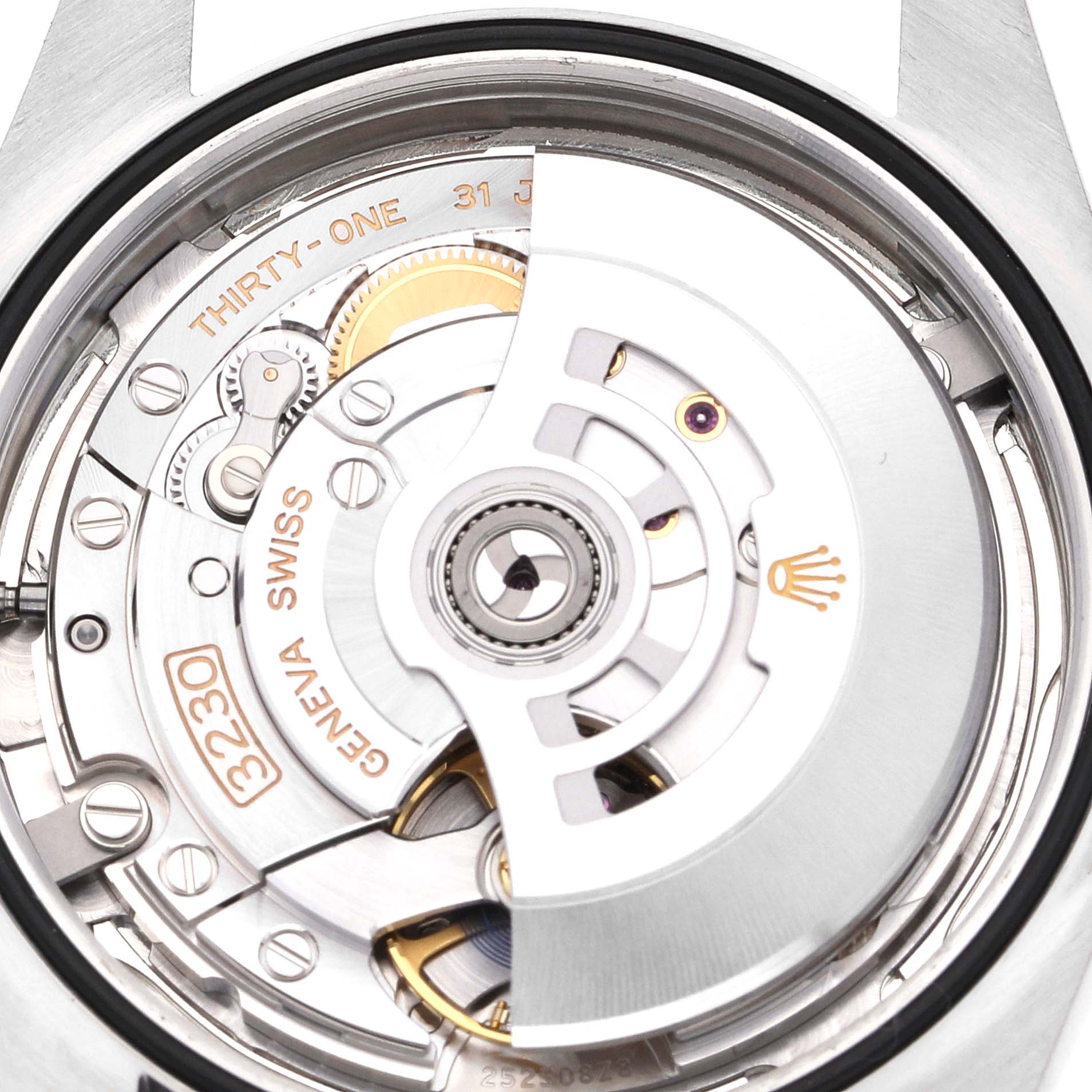 The image shows the inner mechanical movement of the Rolex Oyster Perpetual 124300 Men's Stainless Steel Silver Dial 124300 Men's Stainless Steel Silver Dial watch, focusing on the rotor and Swiss-made components.