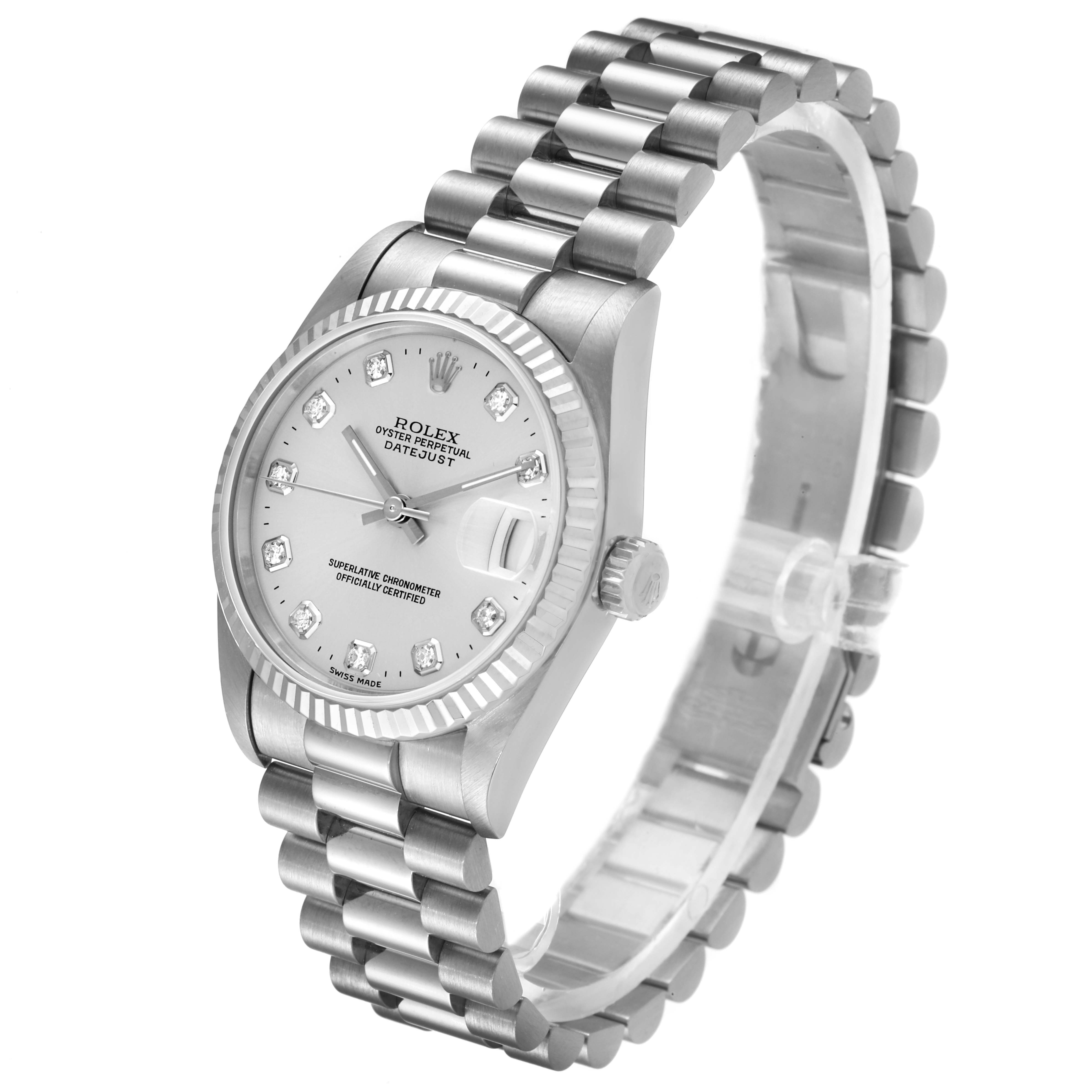 The image shows a Rolex President 68279 Women
s White Gold Silver Dial 68279 Women
s White Gold Silver Dial watch at an angle, highlighting the face, bezel, crown, and part of the bracelet.