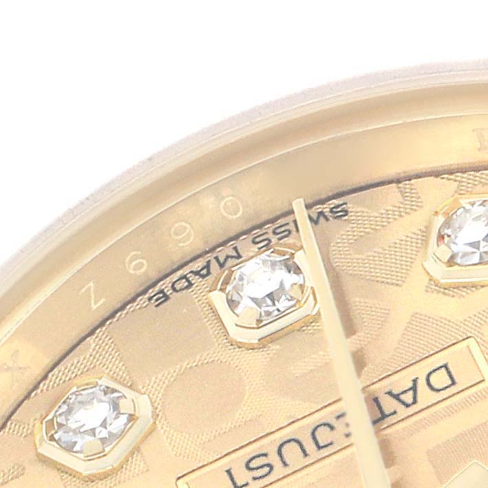 The image shows a close-up of the Rolex President 179178 Women
s Yellow Gold Champagne Dial watch face, highlighting the dial, diamonds, and part of the "Datejust" text.