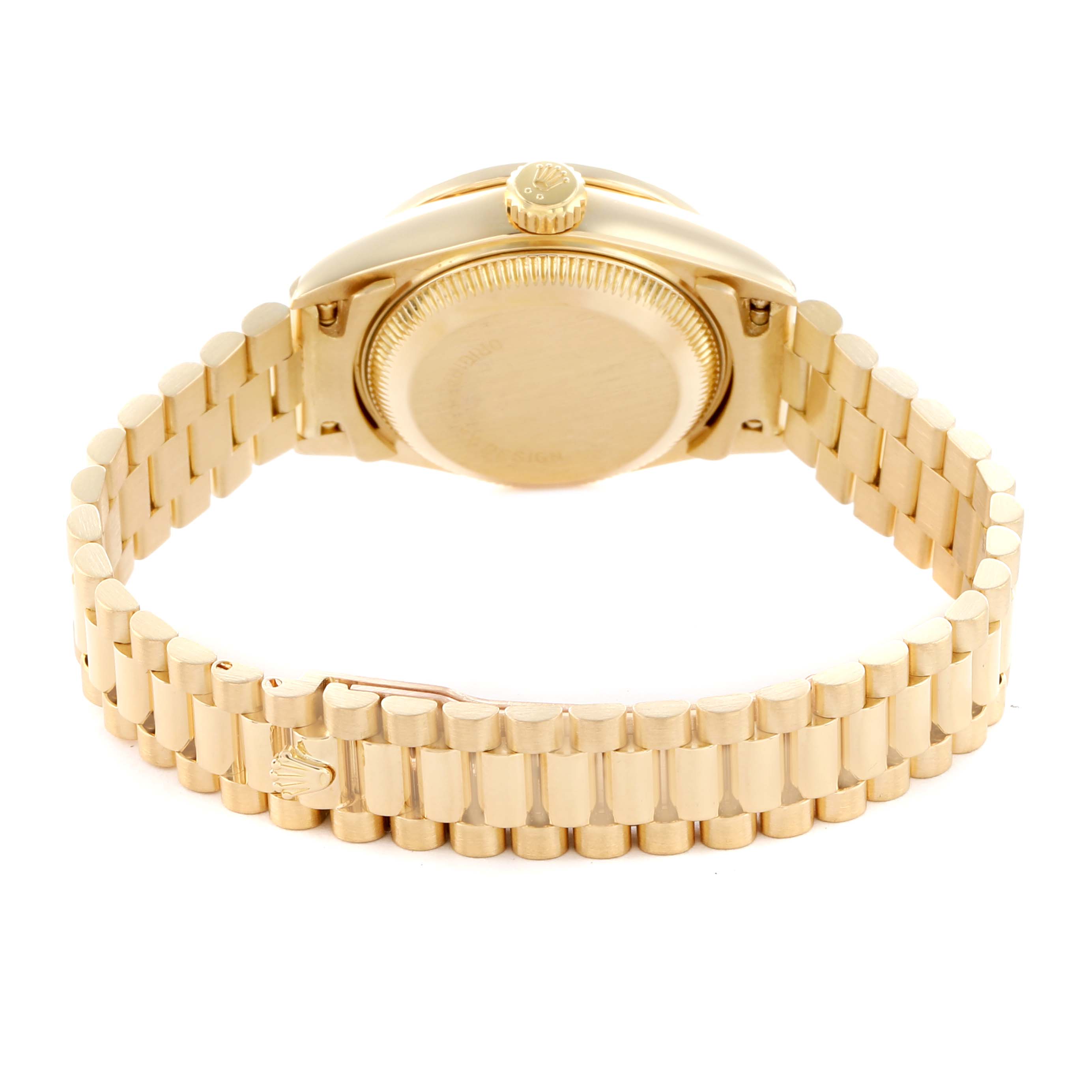 The image shows the Rolex President 69158 Women
s Yellow Gold Champagne Dial model from the back, highlighting the bracelet, clasp, and case back.