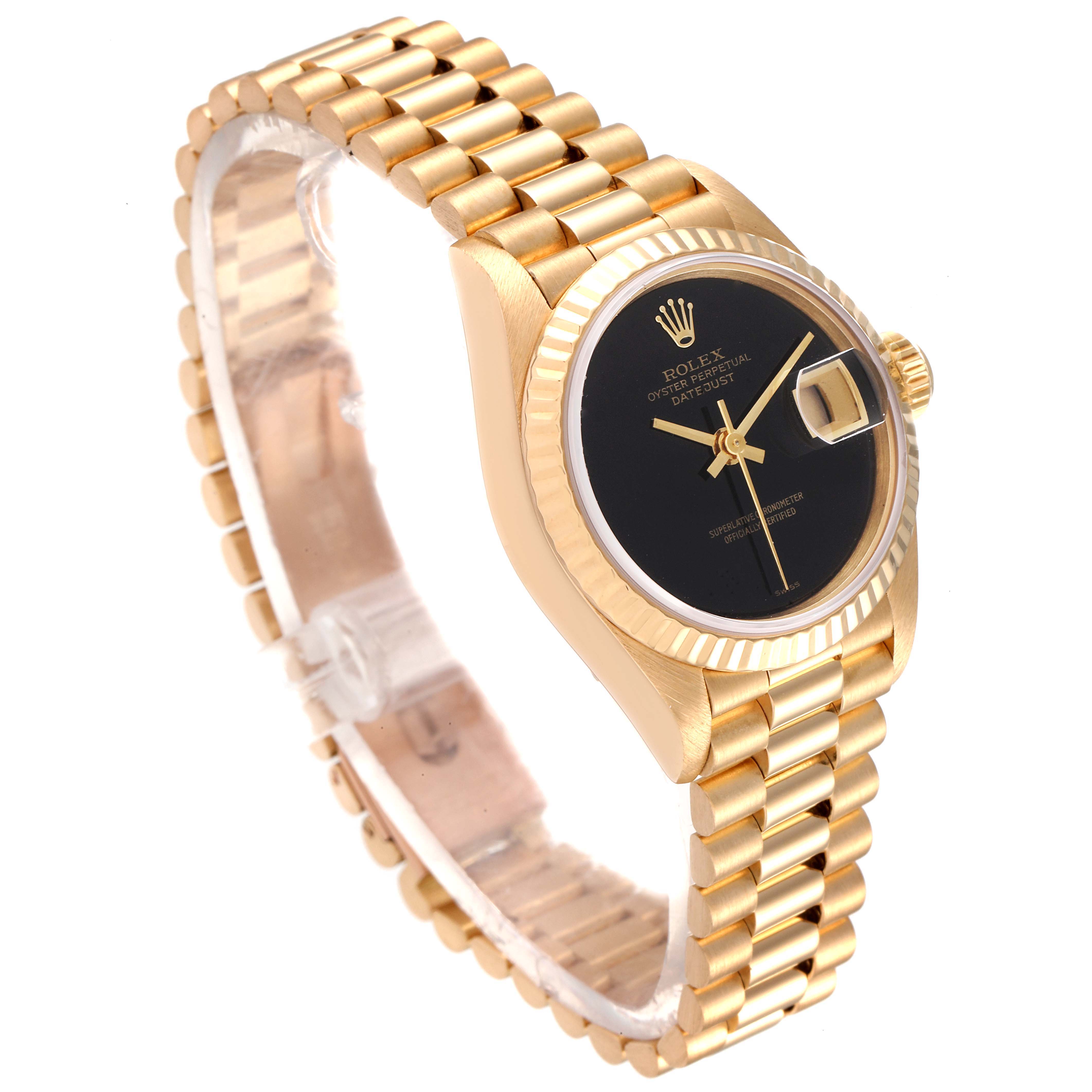 This image shows a Rolex President 69178 Women's Yellow Gold Black Dial 69178 Women's Yellow Gold Black Dial model watch at a slight angle, highlighting its black dial, date display, and gold bracelet.