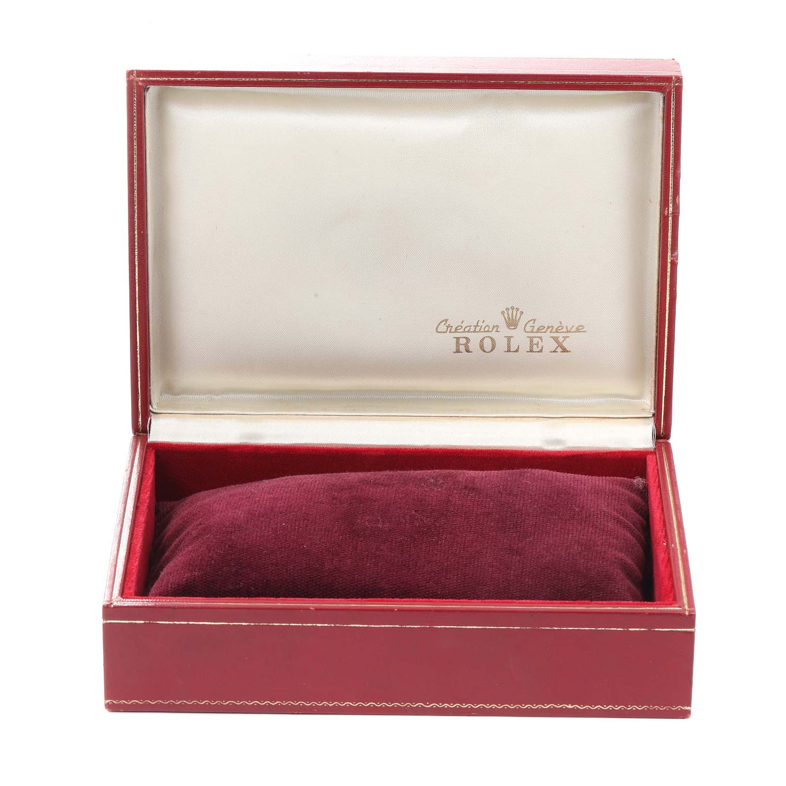 This image shows an empty Rolex President 69178 Women's Yellow Gold Black Dial 69178 Women's Yellow Gold Black Dial watch box made of red leather with a velvet cushion inside.