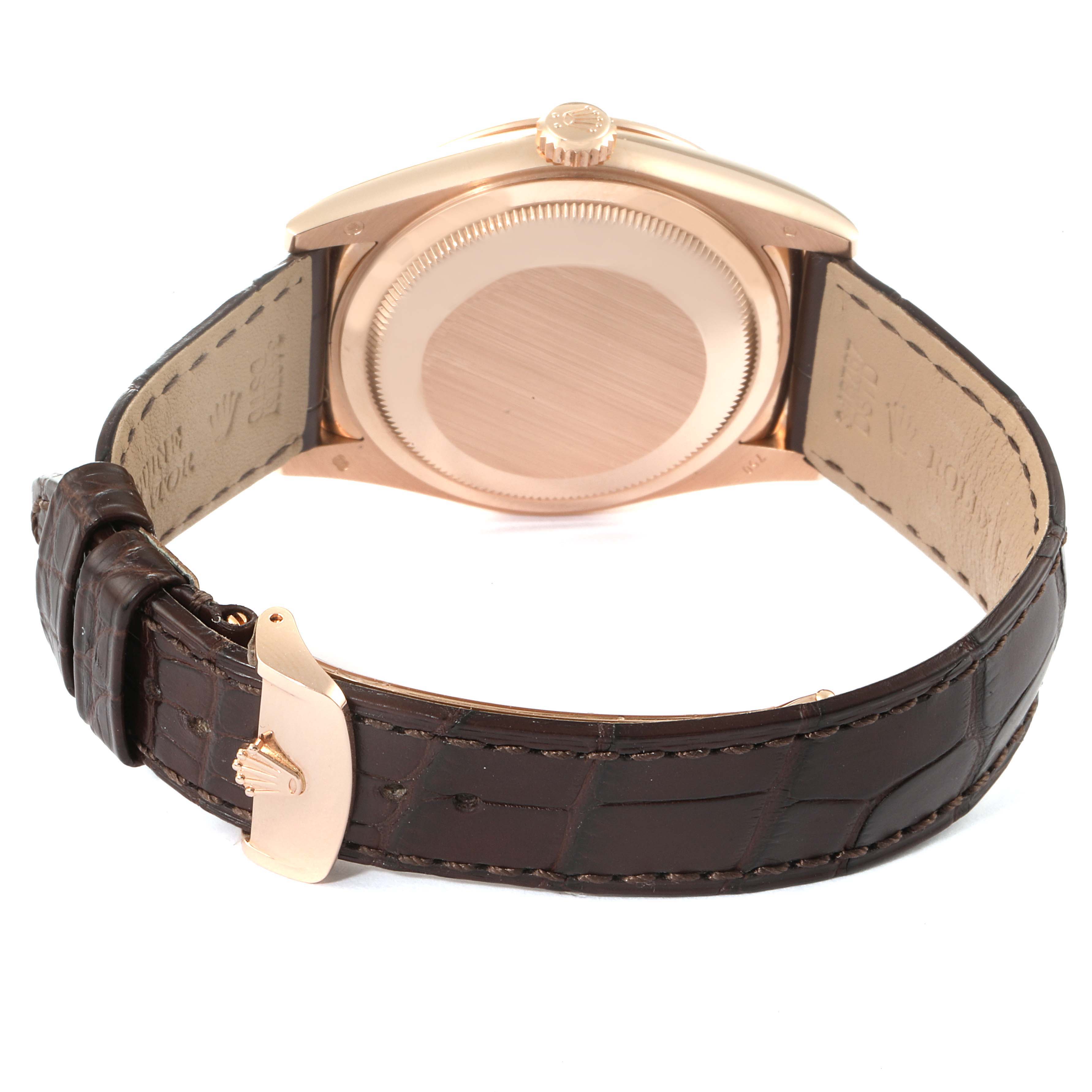 The image shows the back and strap of a Rolex President 118135 Men's Rose Gold Brown Dial 118135 Men's Rose Gold Brown Dial model watch from a rear angle.