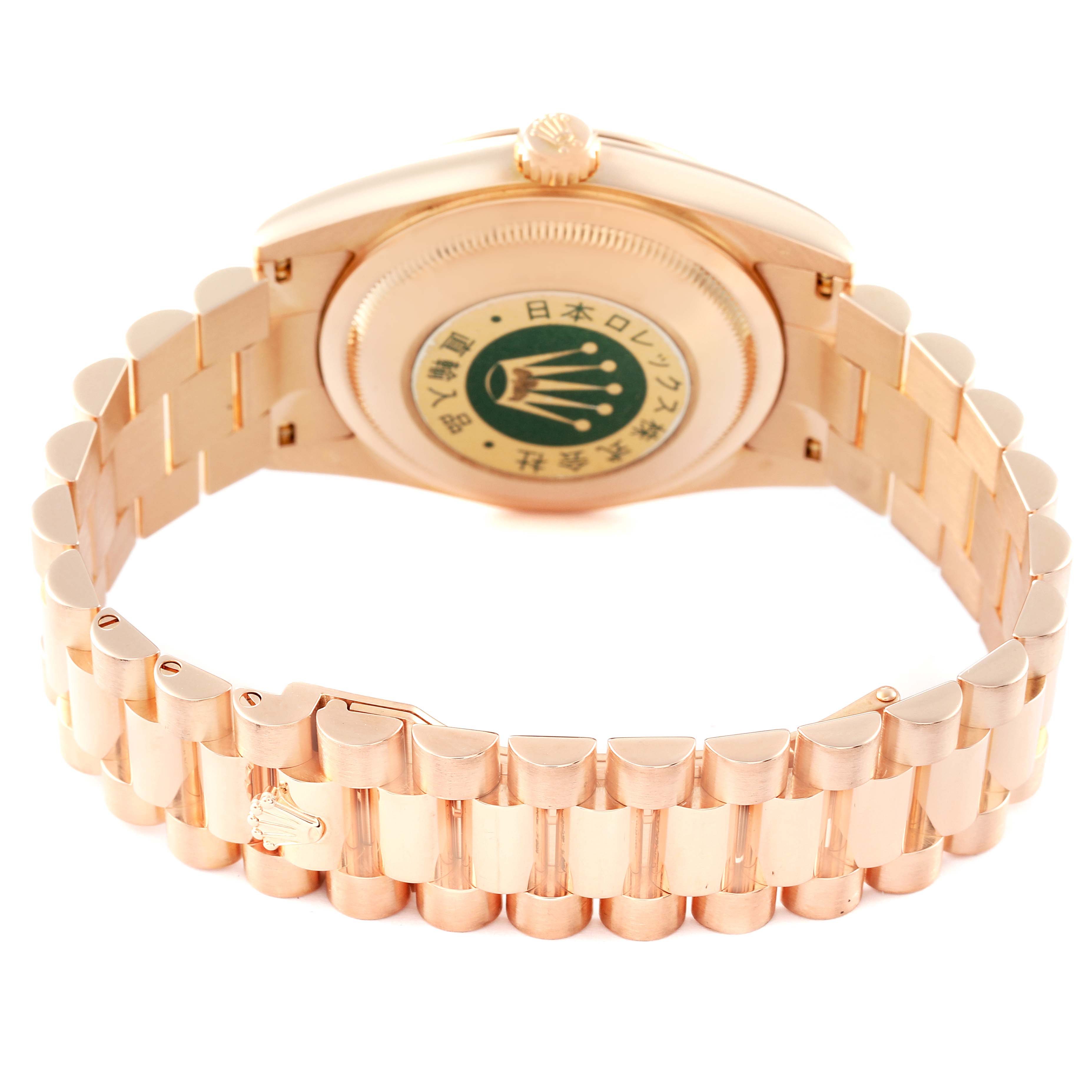 This image shows the back and bracelet of a Rolex President 118235 Men's Rose Gold Champagne Dial 118235 Men's Rose Gold Champagne Dial model watch, highlighting its clasp and case back.