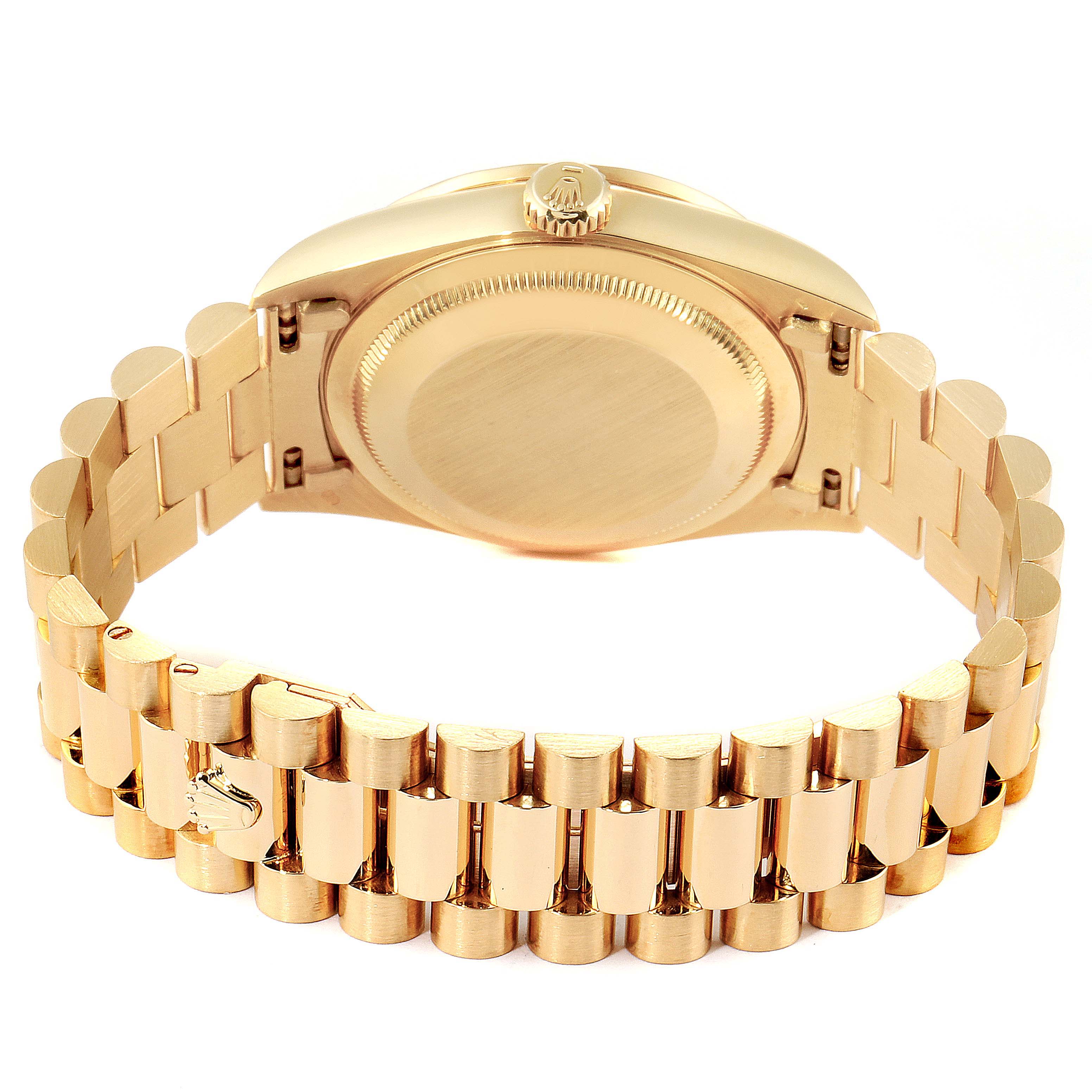 The image shows the back case and bracelet of a Rolex President 18388 Men
s Yellow Gold Champagne Dial 18388 Men
s Yellow Gold Champagne Dial model watch in a fully open position.